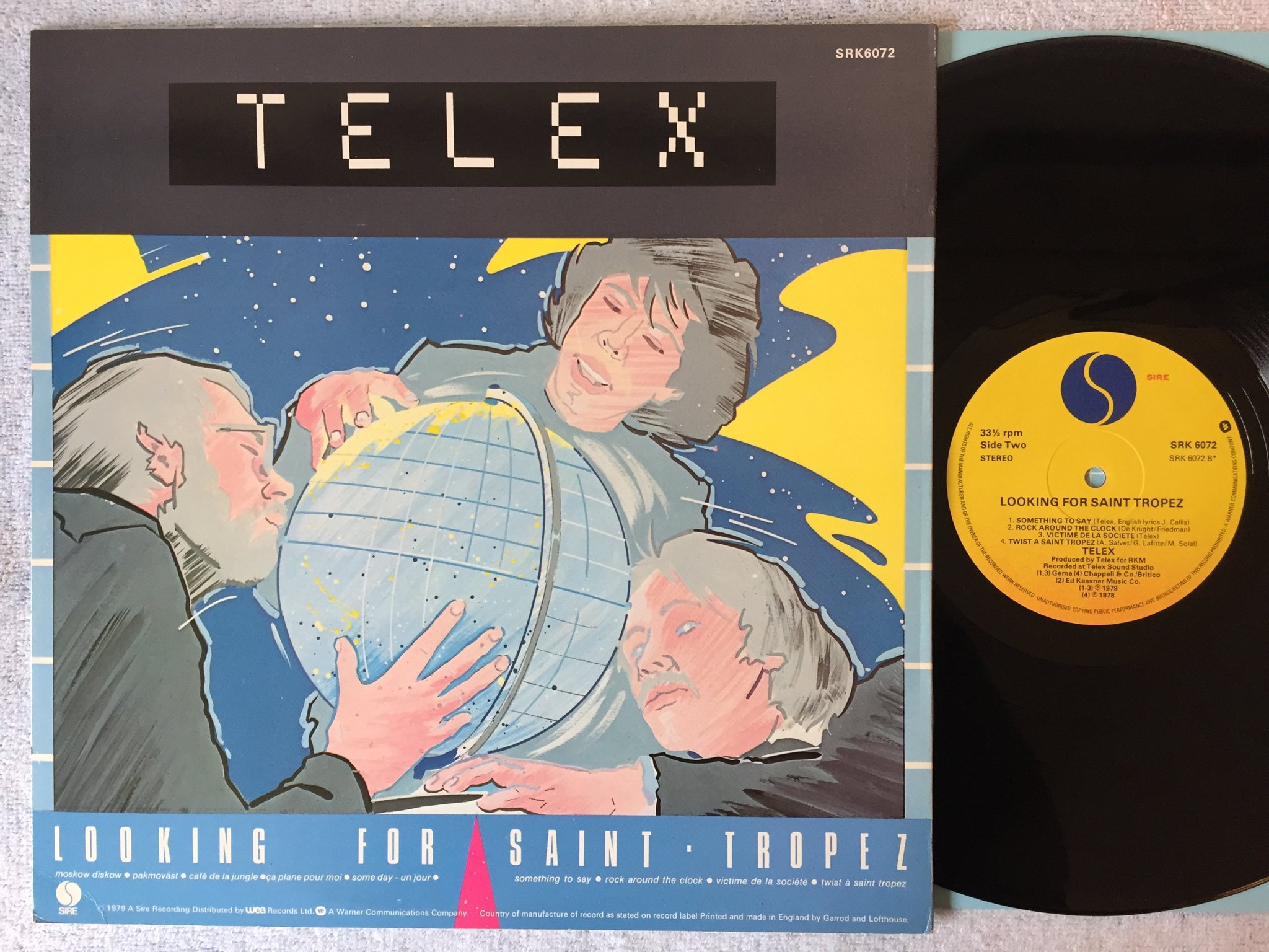 Omslagsbild för skivan TELEX looking for Saint Tropez LP -79 UK SIRE SRK 6072 synth pop 