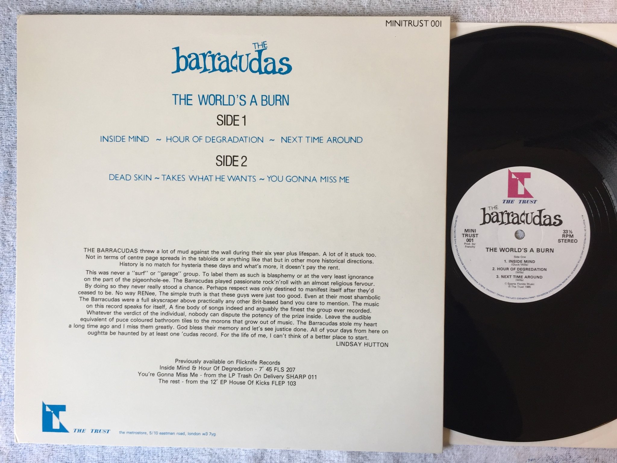 Omslagsbild för skivan BARRACUDAS The World's A Burn 12"EP UK THE TRUST minitrust 001