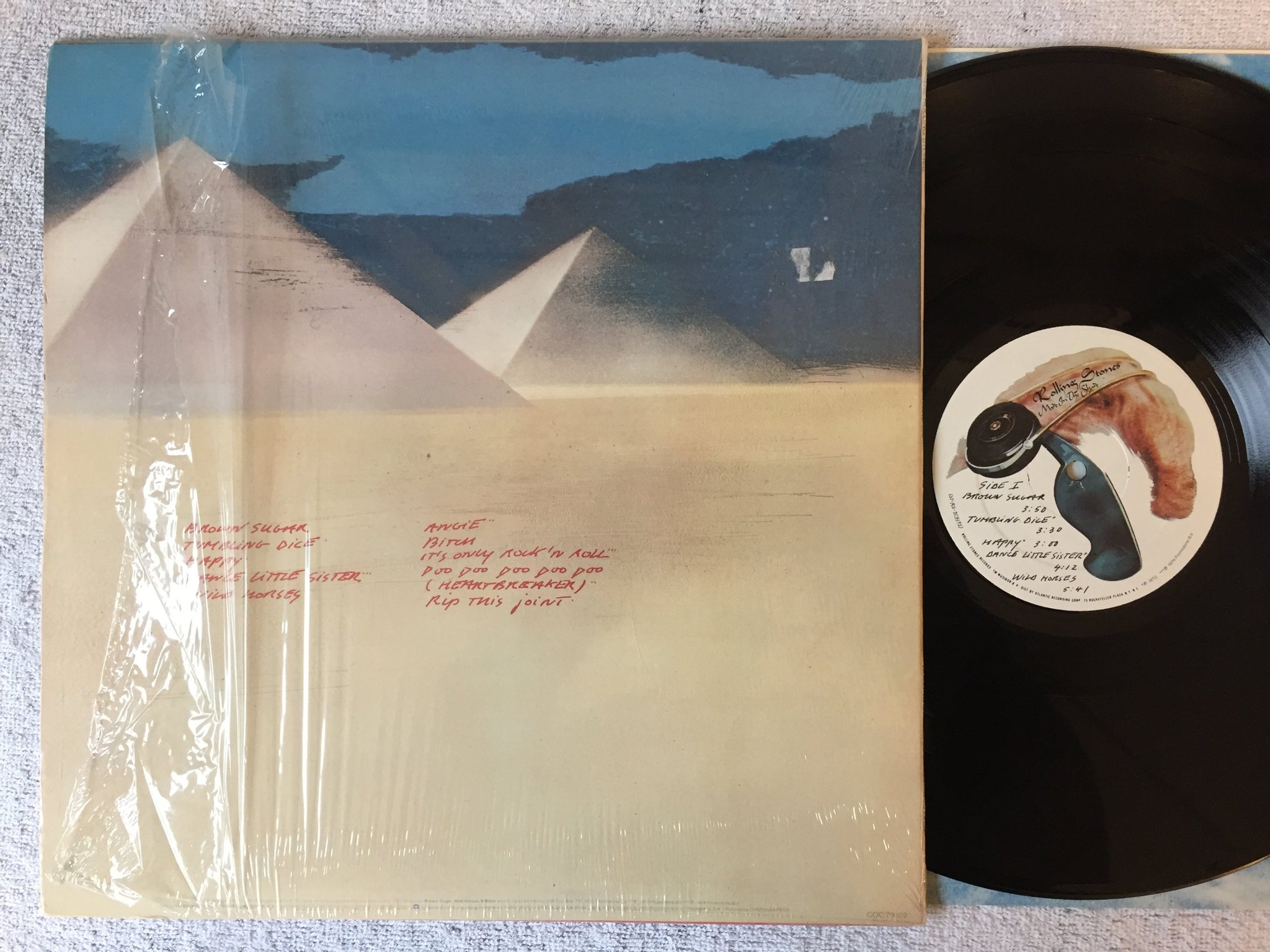 Omslagsbild för skivan THE ROLLING STONES Made In The Shade LP -75 US COC 59104 shrink + hyper sticker
