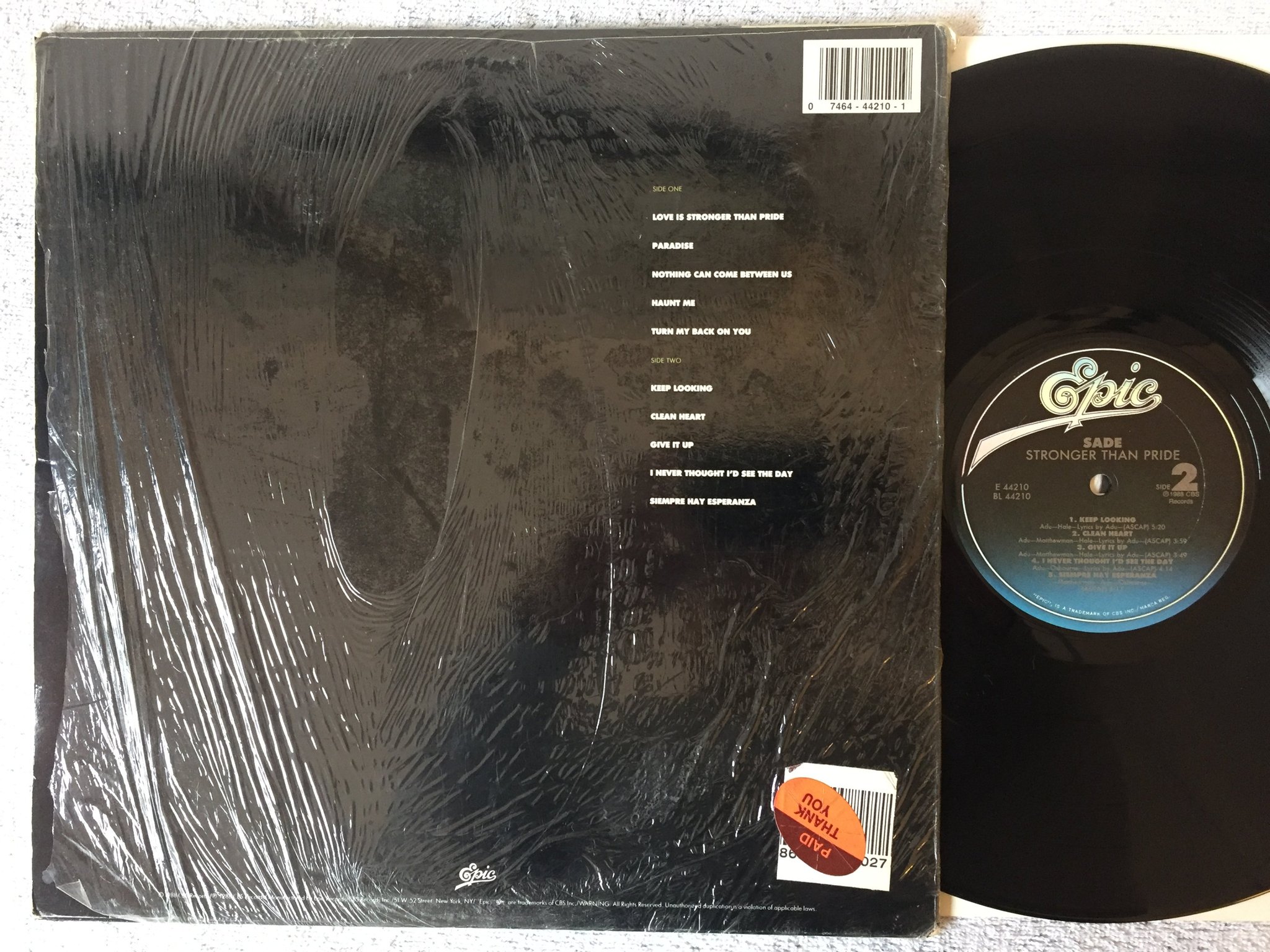 Omslagsbild för skivan SADE stronger than paradise LP -88 US EPIC E 44210 + hyper sticker