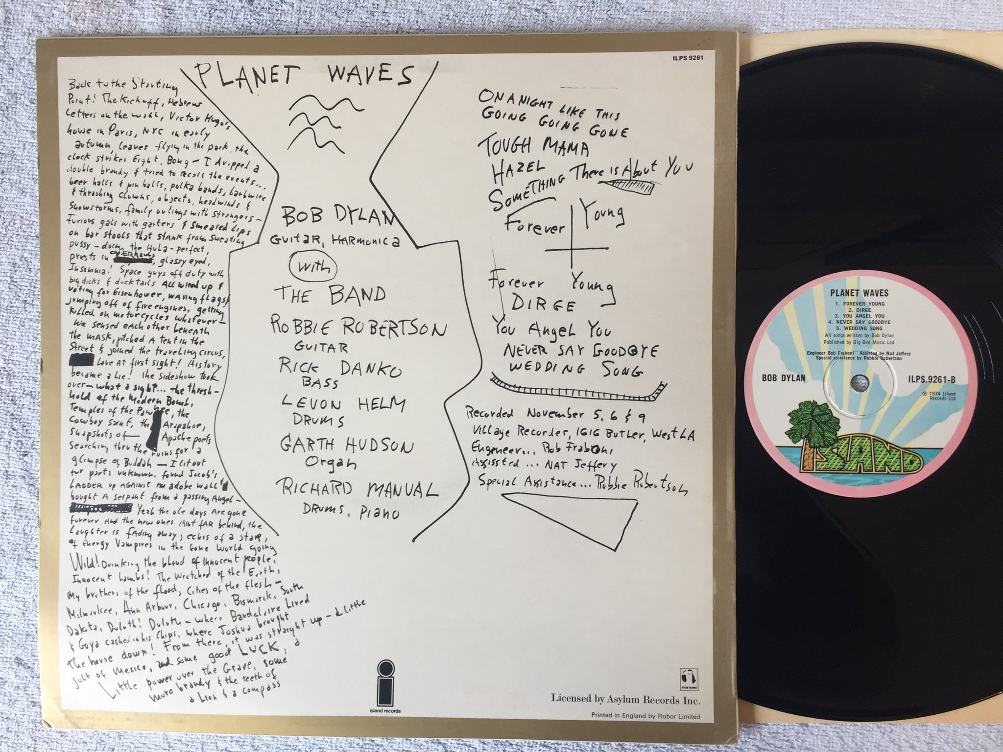 Omslagsbild för skivan BOB DYLAN planet waves LP -74 UK ISLAND pink rim ILPS 9261