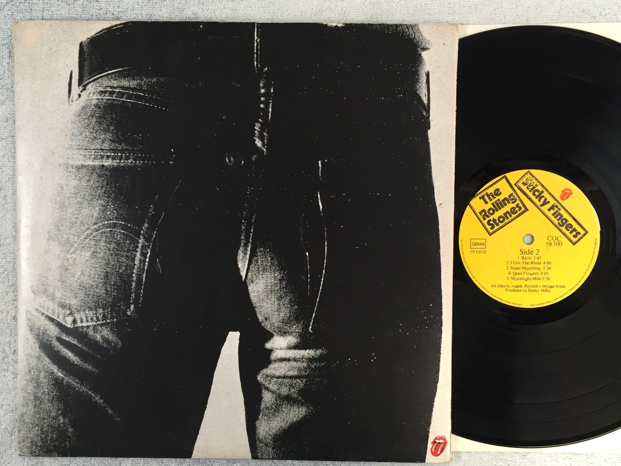 Omslagsbild för skivan THE ROLLING STONES sticky fingers LP Germany COC 59100 Andy Warhol cover art 