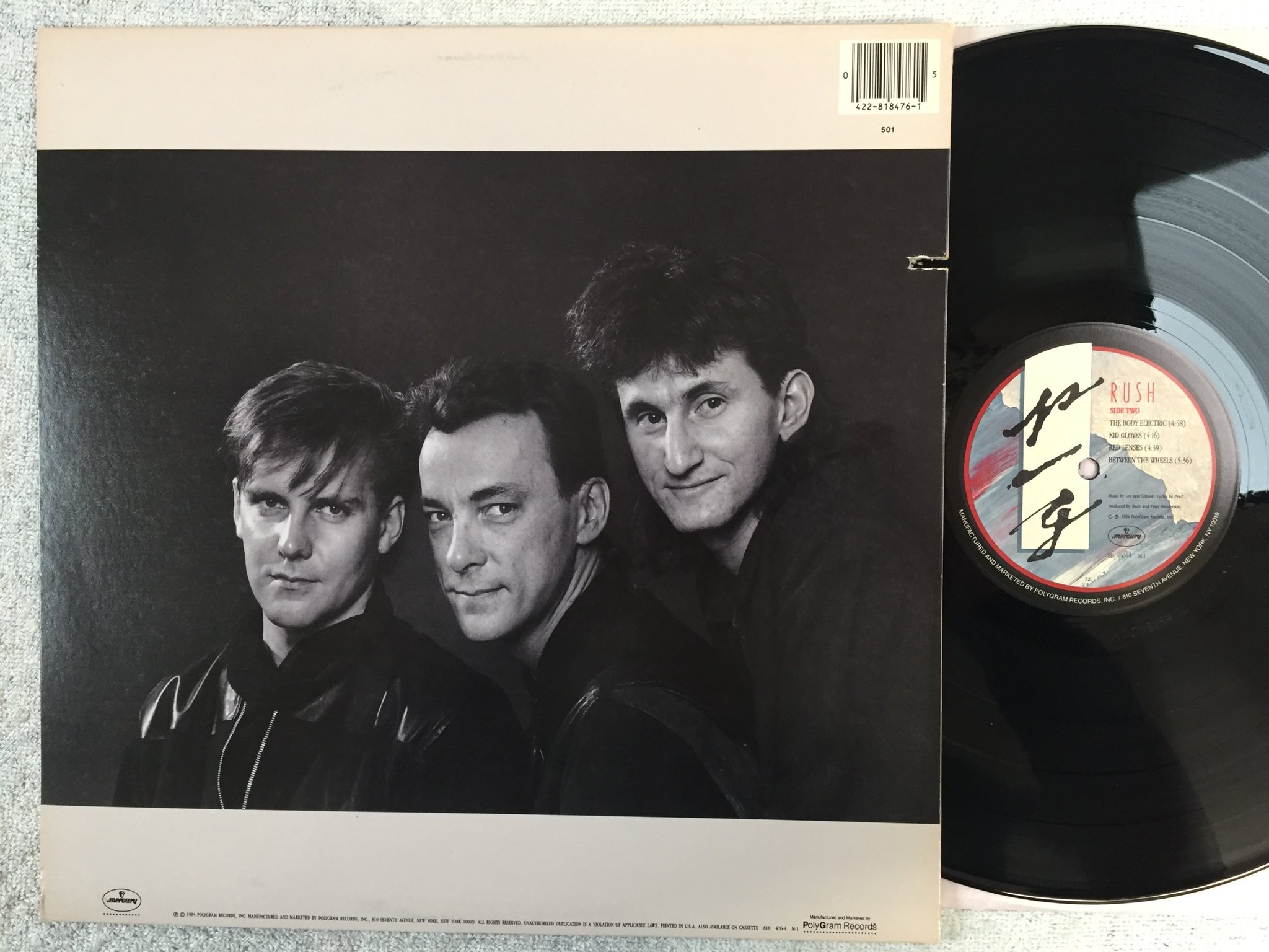 Omslagsbild för skivan RUSH Grace Under Pressure LP -84 US MERCURY 818 476-1 M-1