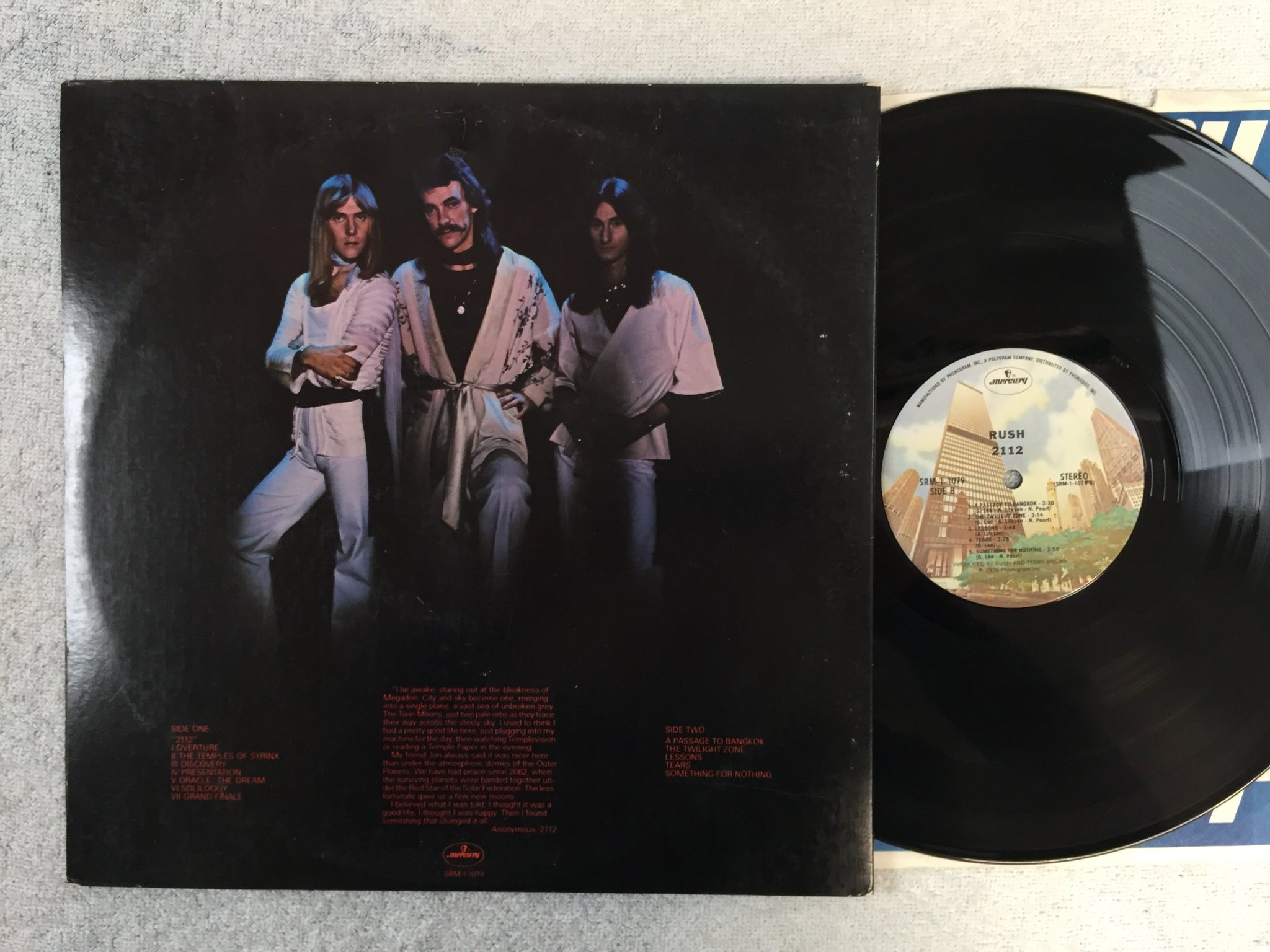 Omslagsbild för skivan RUSH 2112  LP -76 US MERCURY SRM-1-1079