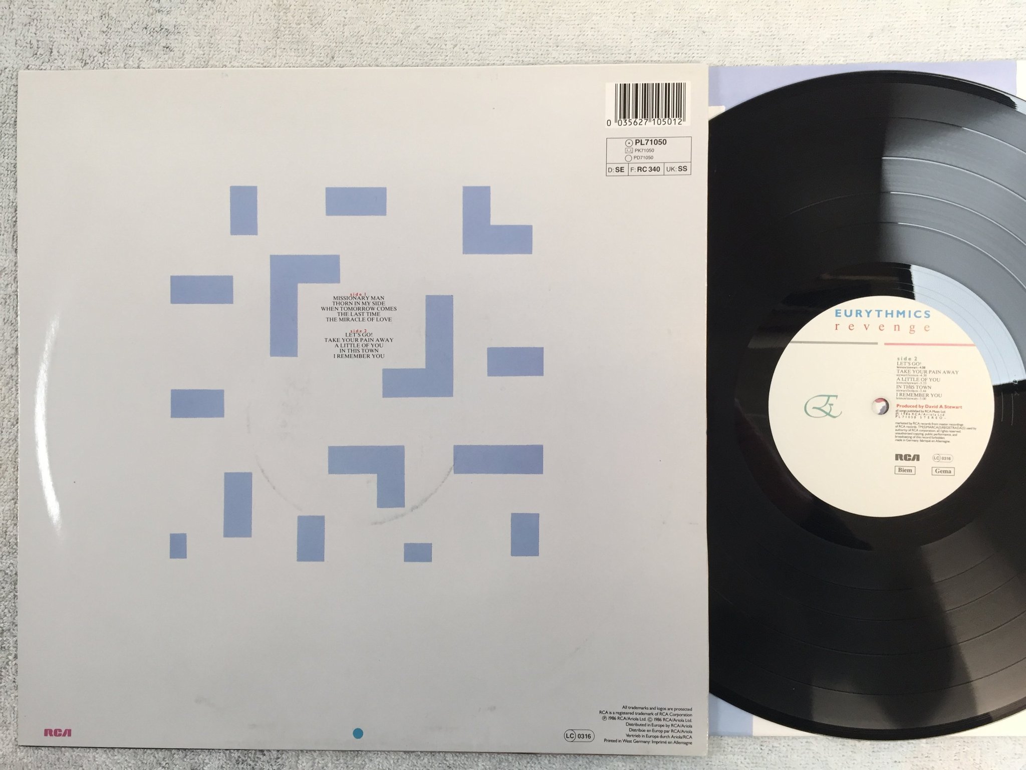 Omslagsbild för skivan EURYTHMICS revenge LP -86 Hol RCA PL 71050 "miracle of love"