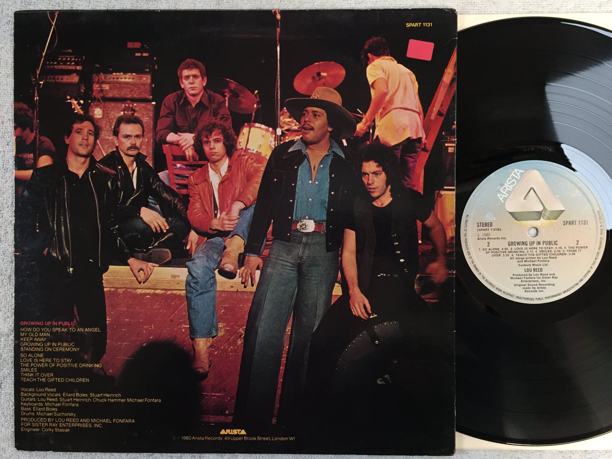 Omslagsbild för skivan LOU REED growing up in public LP -80 UK ARISTA SPART 1131