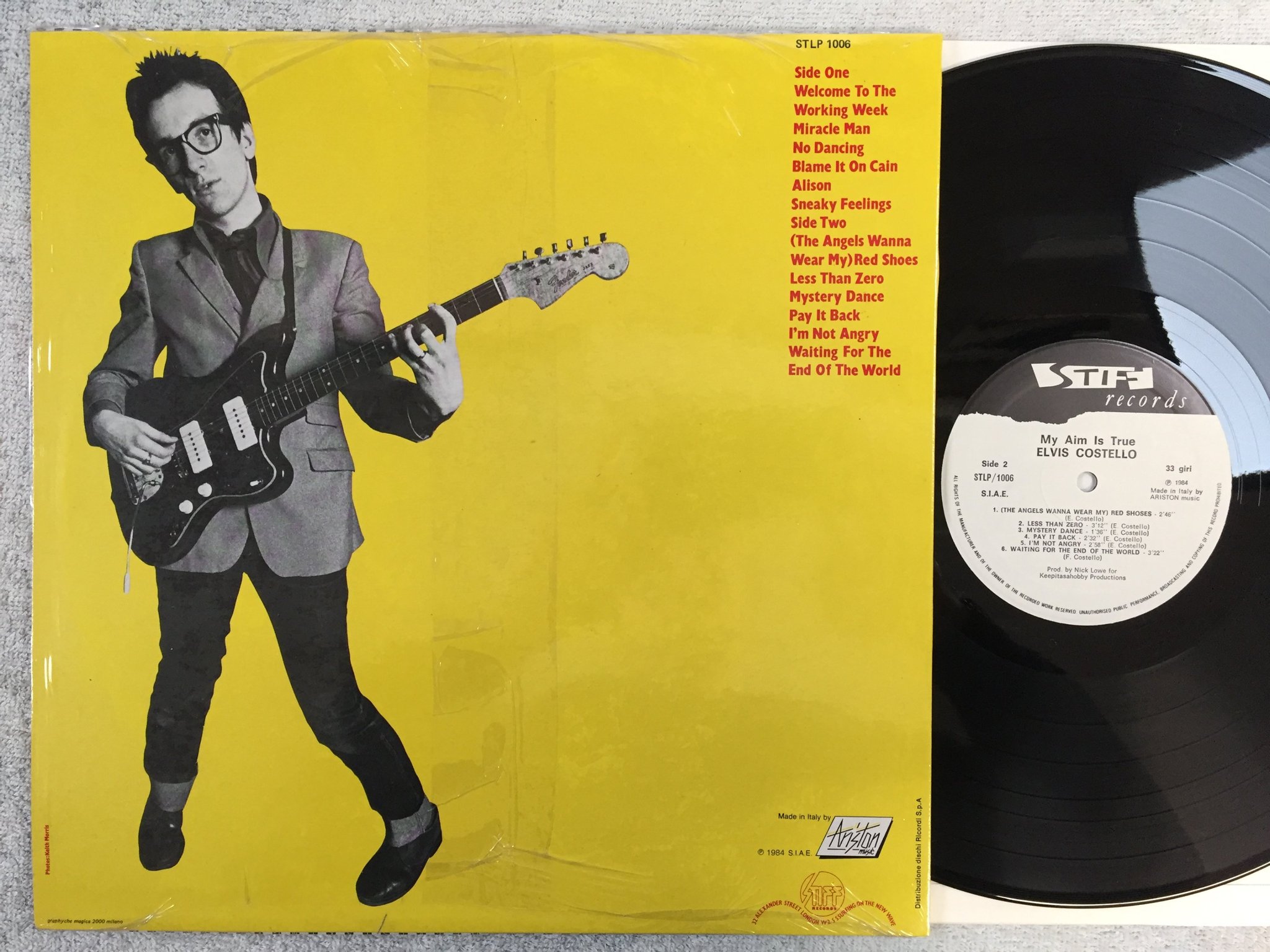 Omslagsbild för skivan ELVIS COSTELLO my aim is true LP -84 Ita STIFF RECORDS STLP / 1006