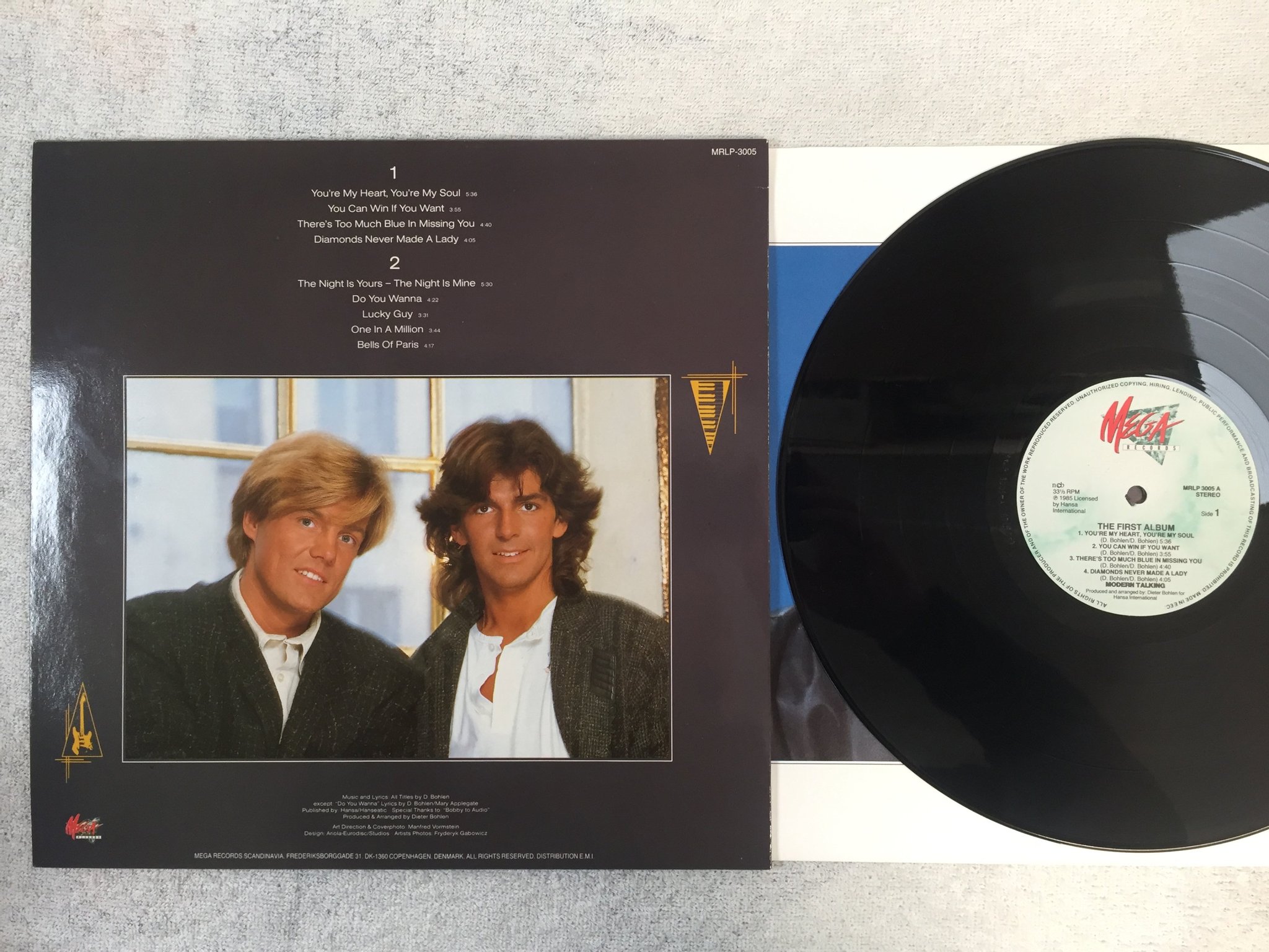 Omslagsbild för skivan MODERN TALKING the first album LP -85 ECC MEGA MRLP 3005
