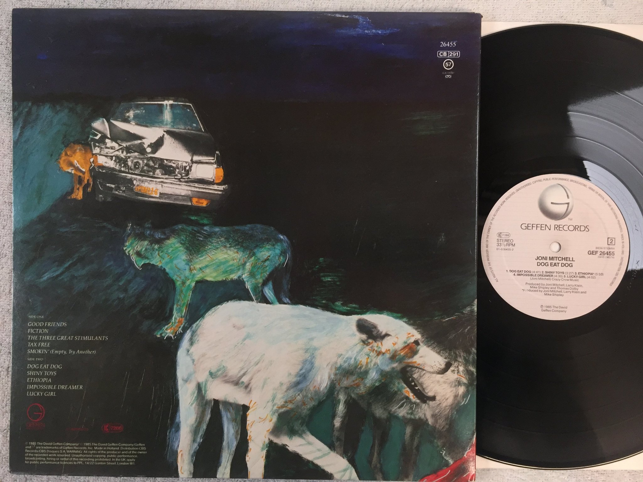 Omslagsbild för skivan JONI MITCHELL dog eat dog LP -85 Hol GEFFEN GEF 26455