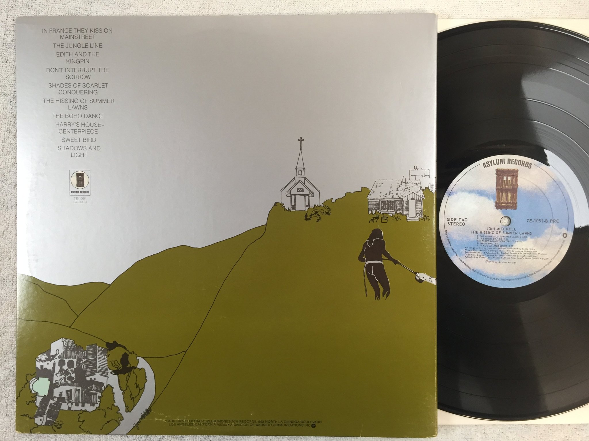 Omslagsbild för skivan JONI MITCHELL the hissing of summer lawns LP -75 US ASYLUM 7E 1051 PRC