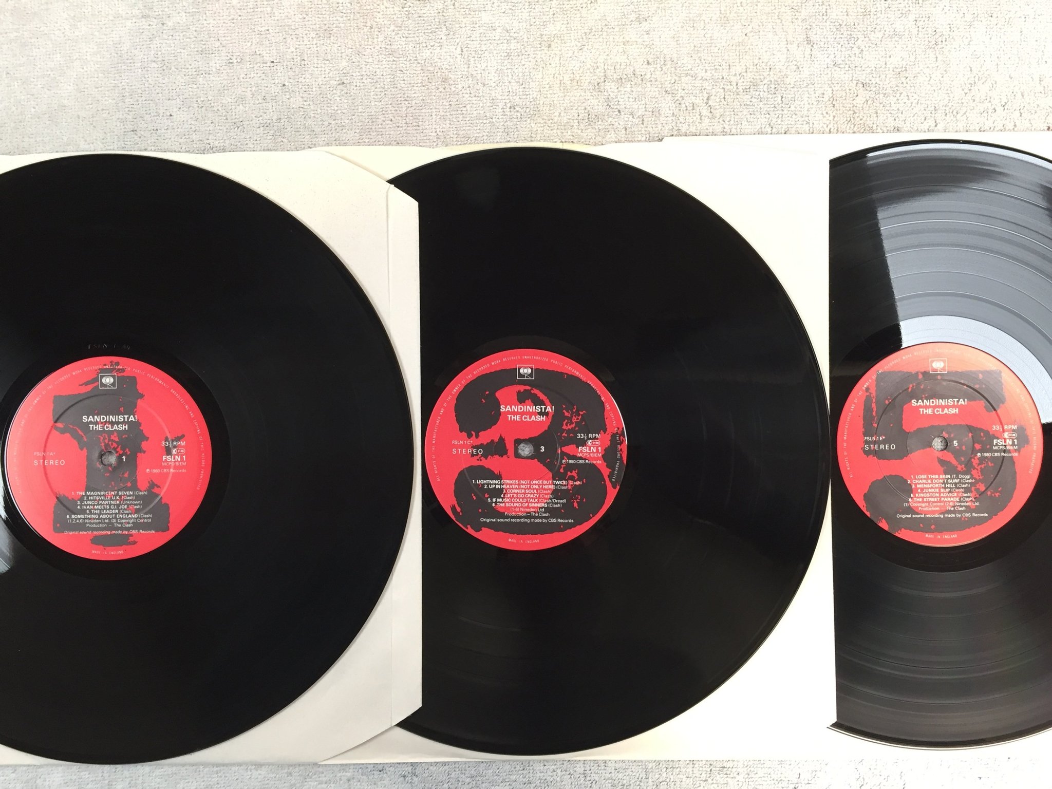 Omslagsbild för skivan THE CLASH sandinista! 3xLP -80 UK CBS FSLN 1 
