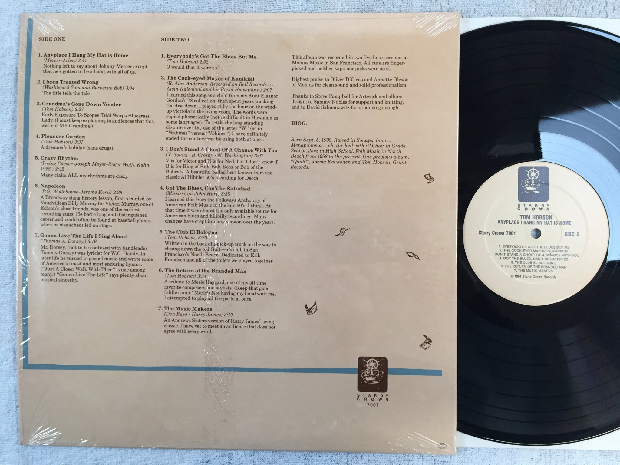Omslagsbild för skivan TOM HOBSON anyplace I hang my hat is my home LP -84 US STARRY CROWN 7001