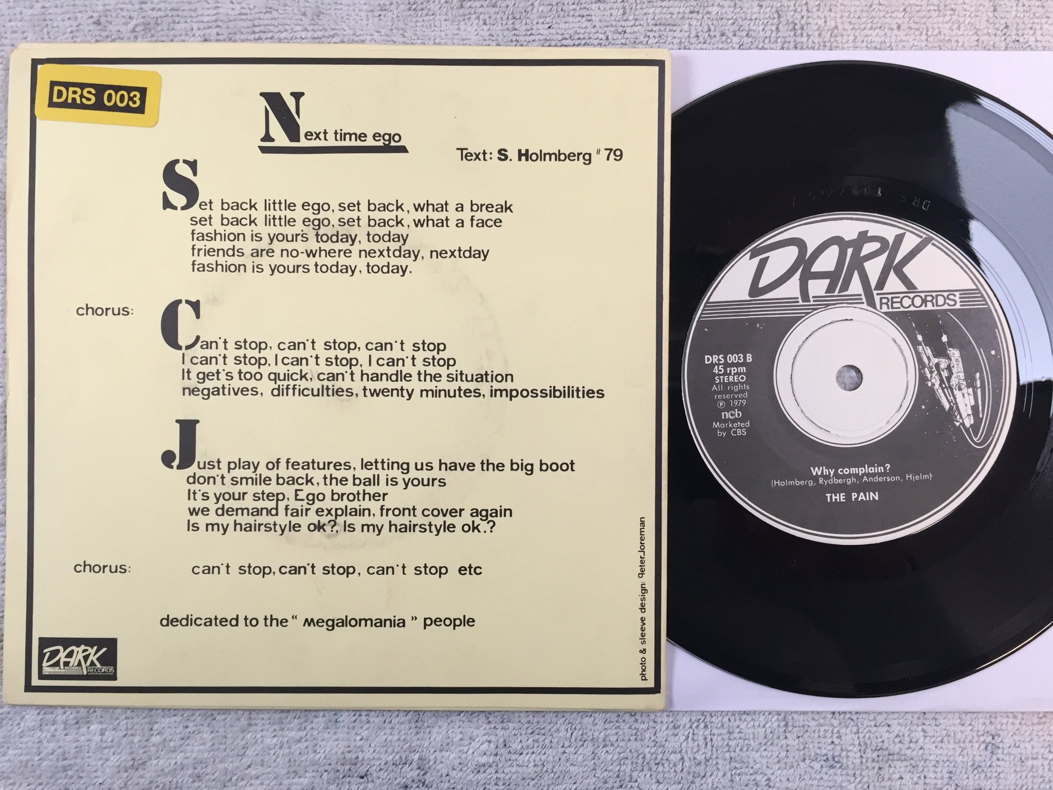 Omslagsbild för skivan THE PAIN next time ego 7"single -79 Swe DARK DRS 003 punk