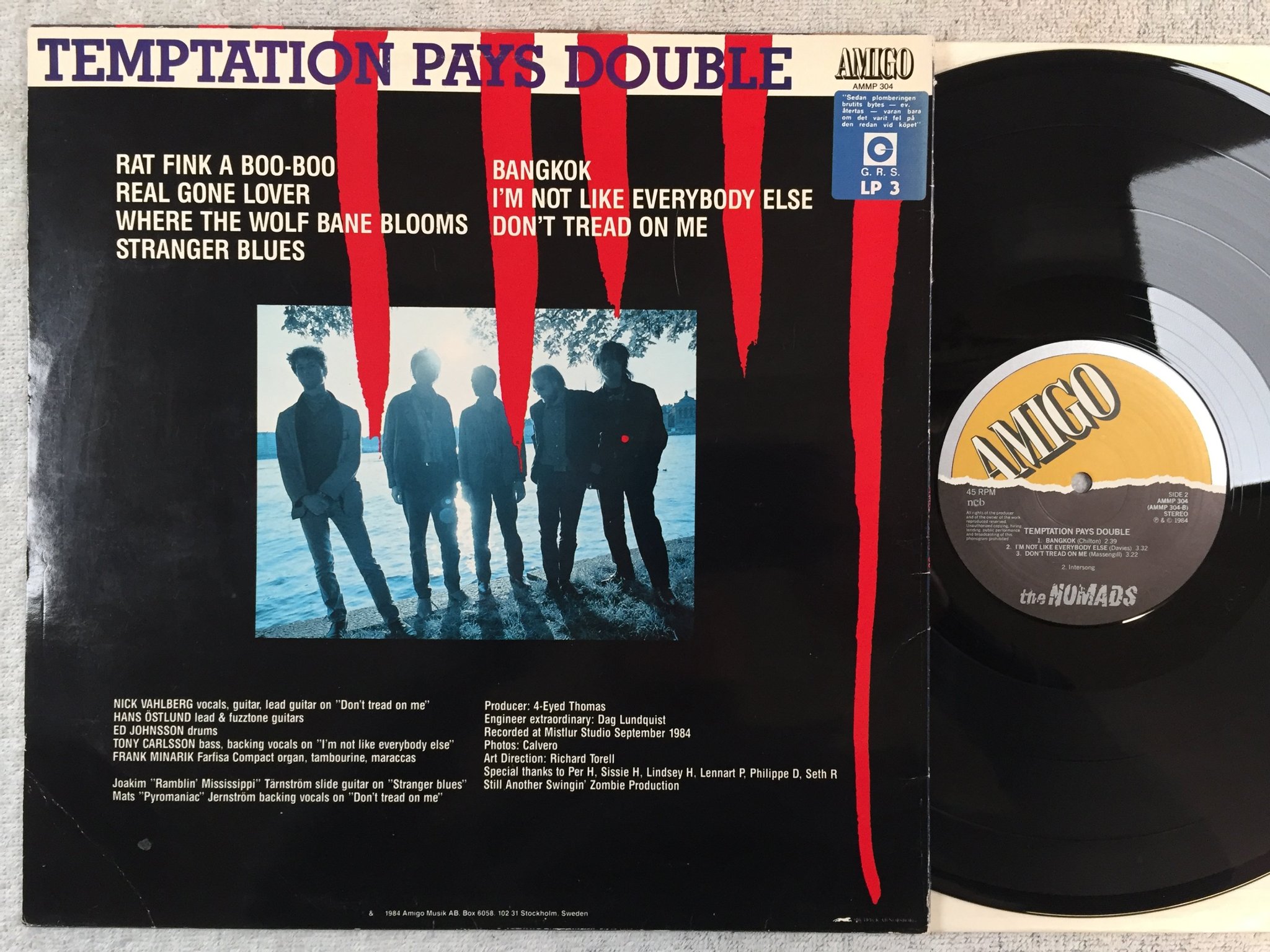 Omslagsbild för skivan THE NOMADS temptation pays double LP -84 Swe AMIGO AMMP 304