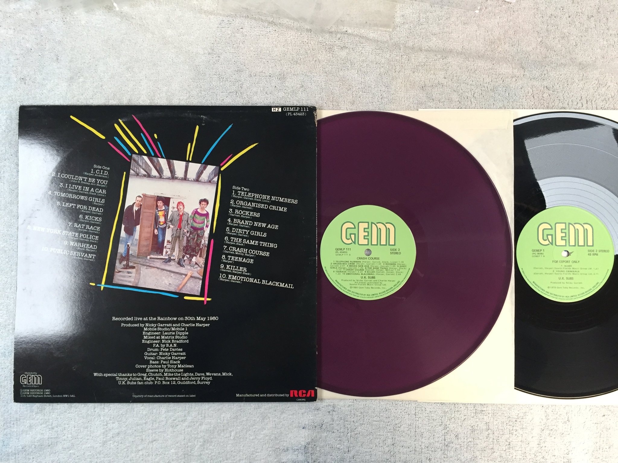 Omslagsbild för skivan UK SUBS crash course 2xLP -80 UK GEM GEMLP 111 purple & black vinyl