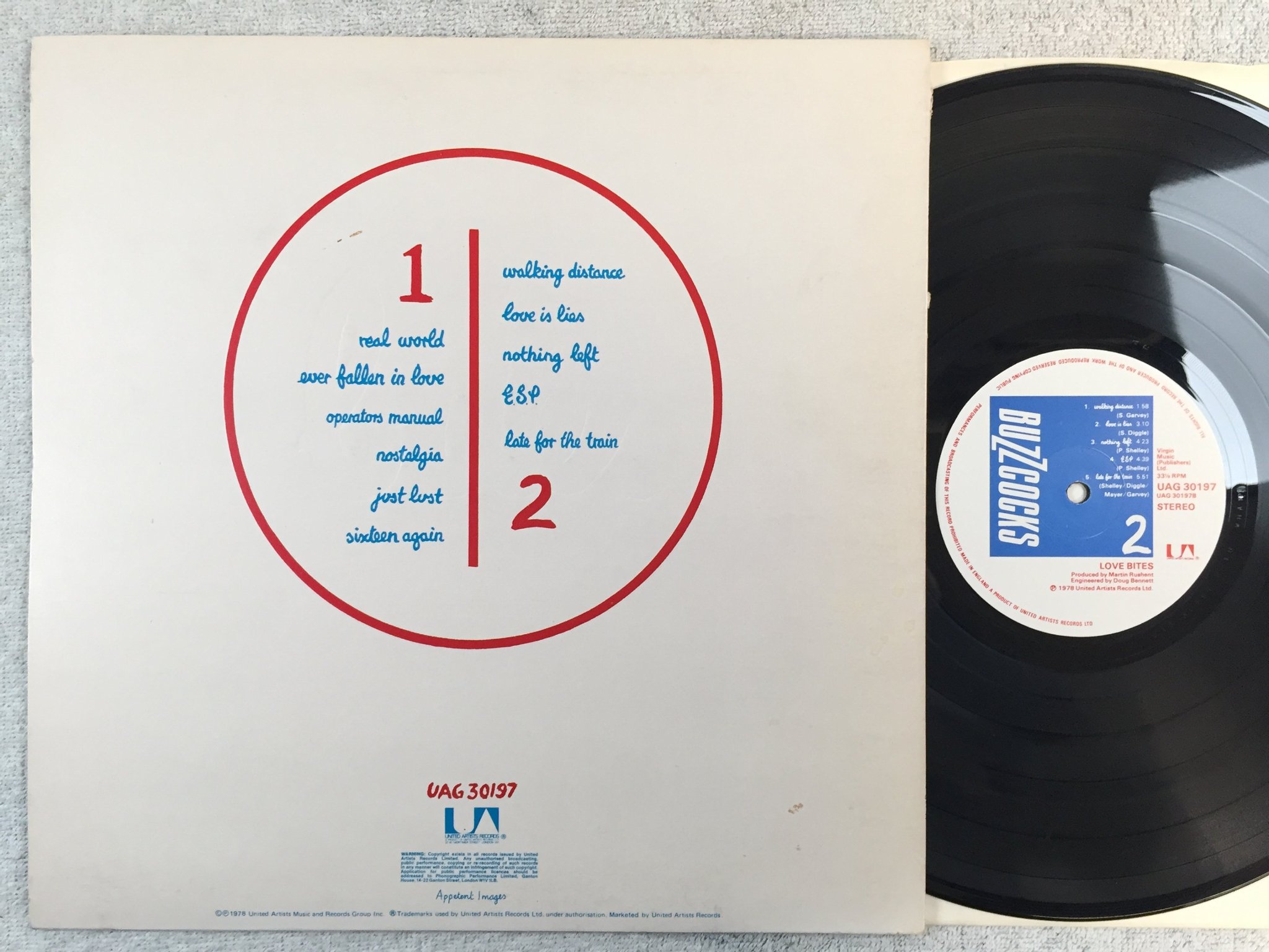 Omslagsbild för skivan BUZZCOCKS love bites LP -78 UK UNITED UAG 30197 signed by all members YEAH!!!!