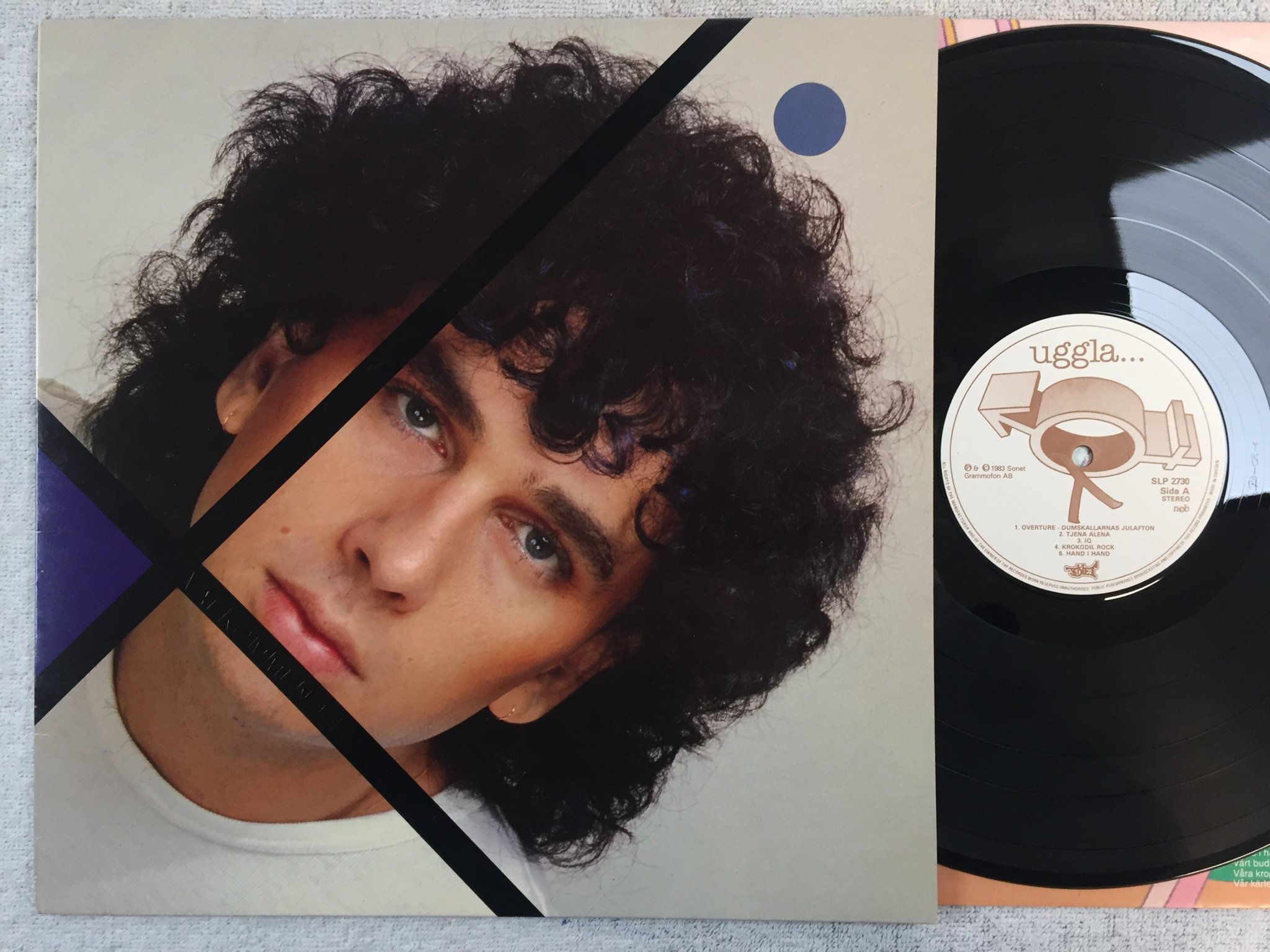 Omslagsbild för skivan MAGNUS UGGLA välkommen till folkhemmet LP -83 SONET SLP-2730