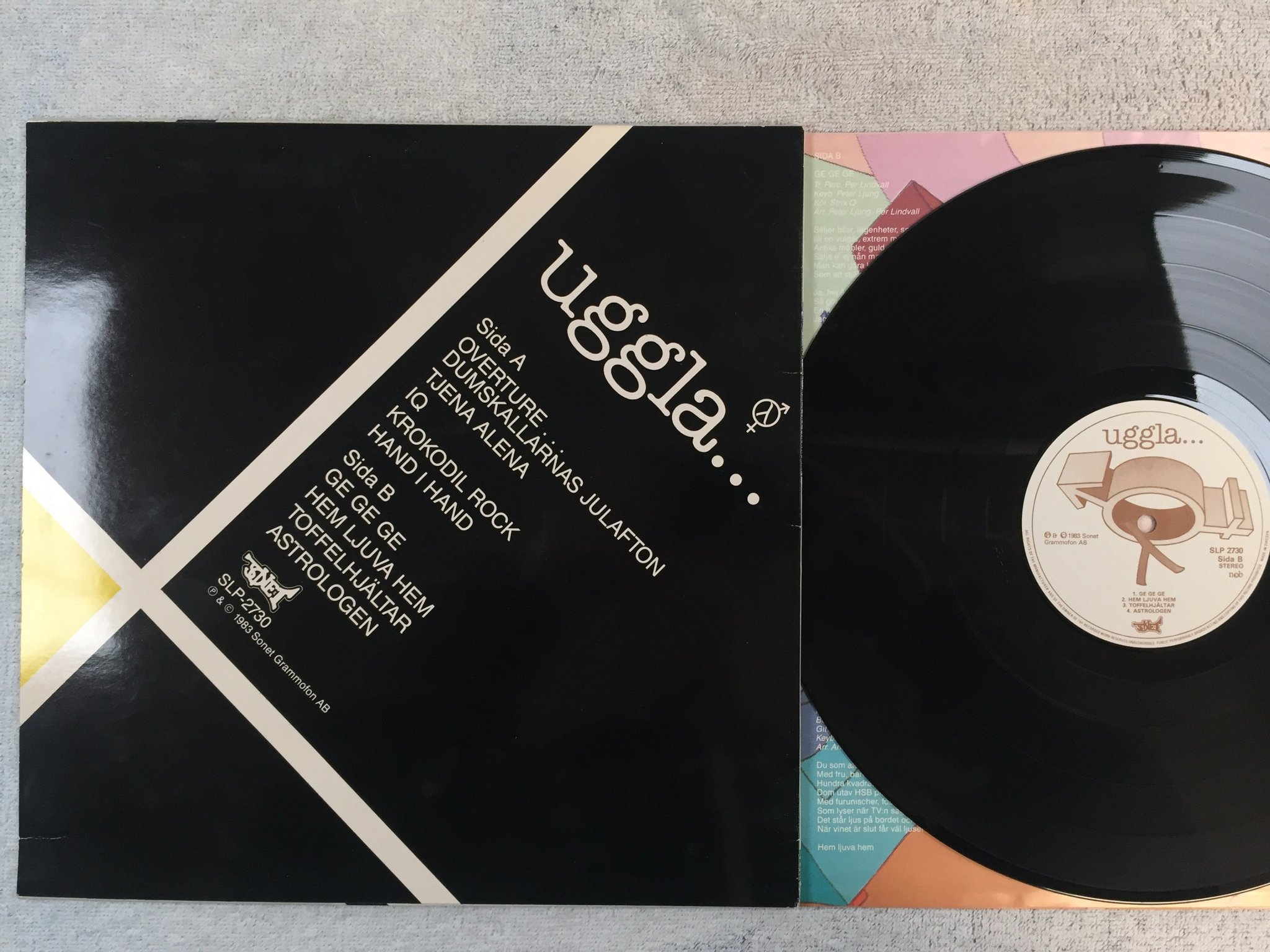 Omslagsbild för skivan MAGNUS UGGLA välkommen till folkhemmet LP -83 SONET SLP-2730