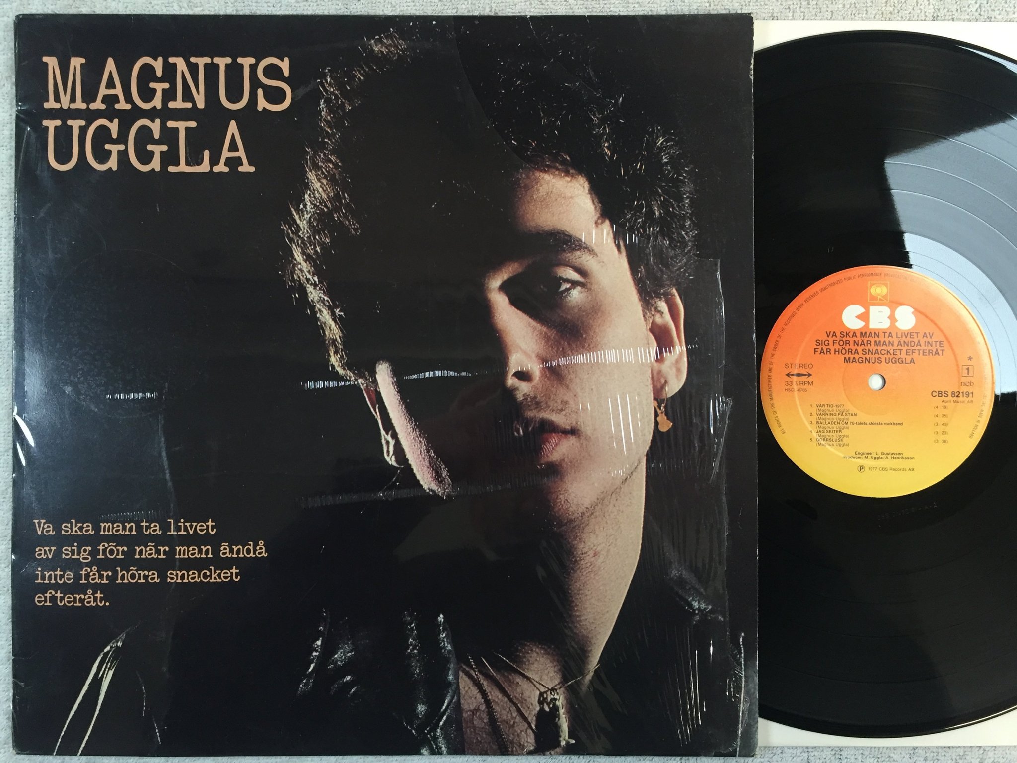 Omslagsbild för skivan MAGNUS UGGLA varför ska man... LP -77 CBS 82191 "vår tid 1977"