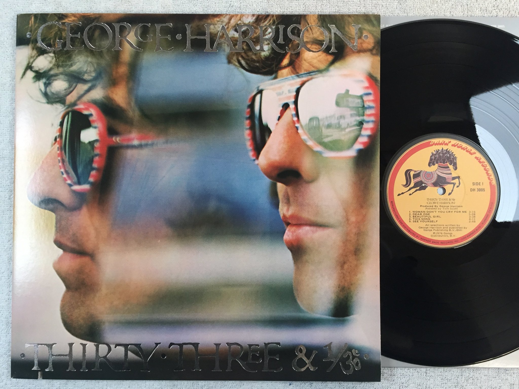 Omslagsbild för skivan GEORGE HARRISON thirty three & 1/3 LP -76 US DARK HORSE DH 3005
