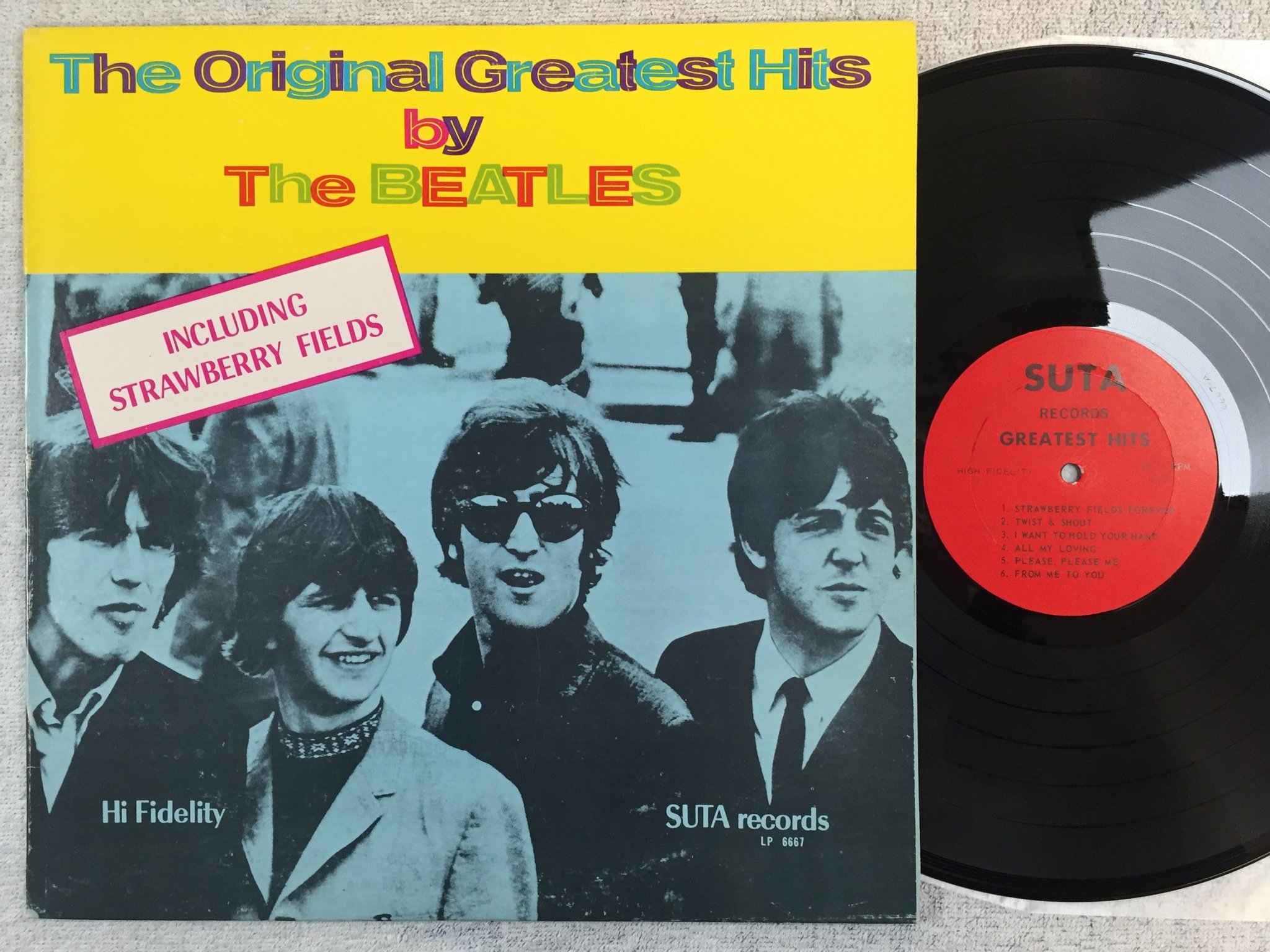 Omslagsbild för skivan THE BEATLES the original greatest hits LP SUTA 6667