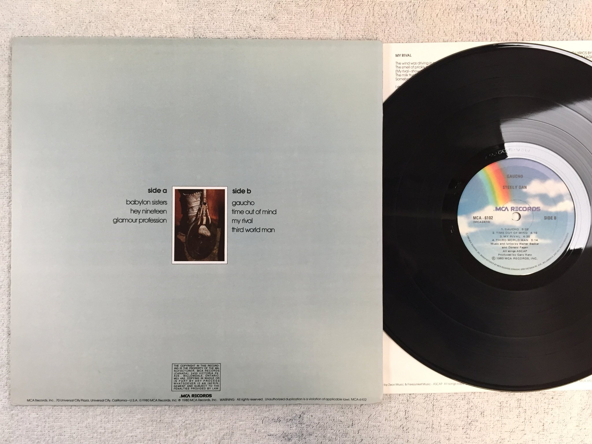 Omslagsbild för skivan STEELY DAN gaucho LP -80 Can MCA 6102