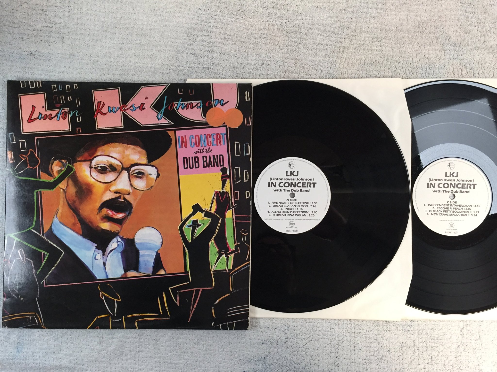 Omslagsbild för skivan LINTON KWESI JOHNSON in concert w/ the dub band 2xLP NCB rough trade LKJ 006