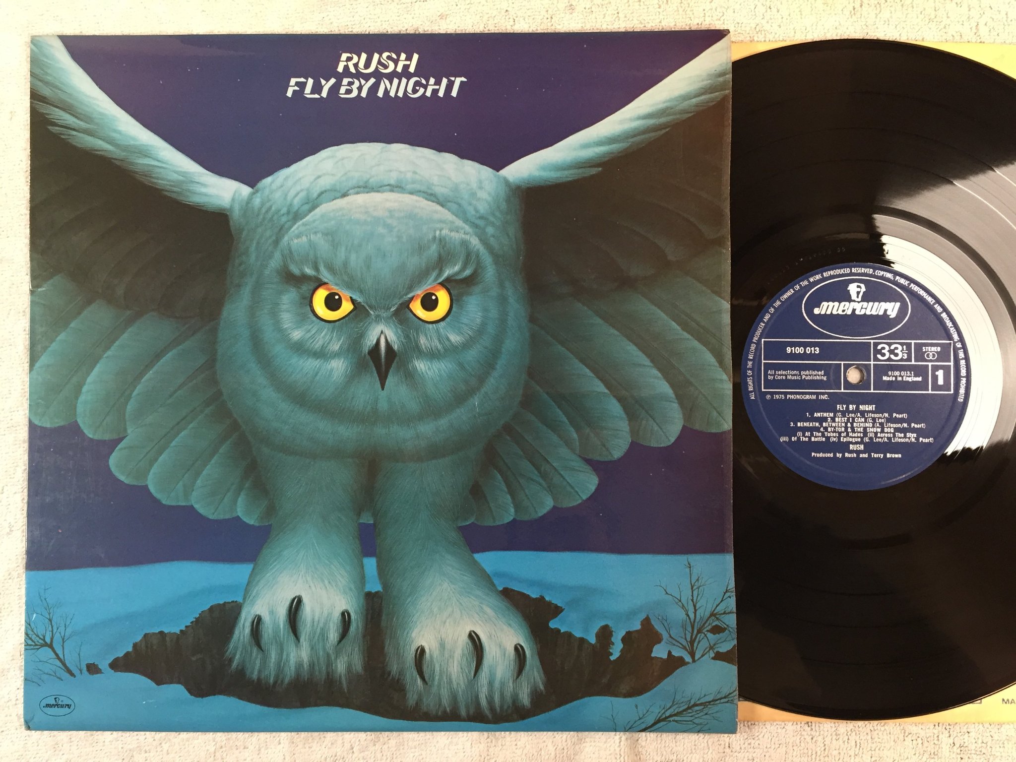 Omslagsbild för skivan RUSH fly by night LP -75 UK MERCURY 9100013 complete with insert