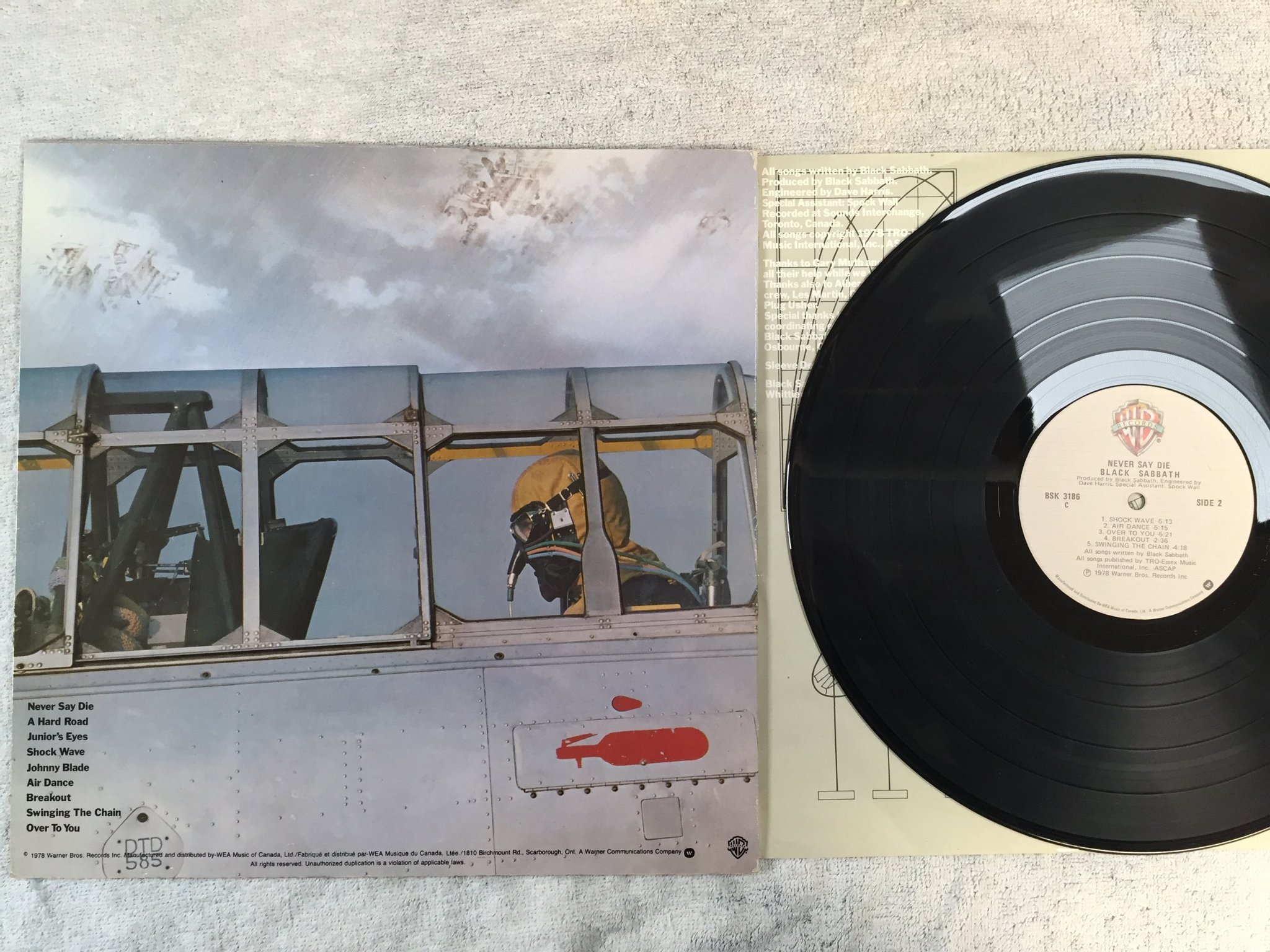 Omslagsbild för skivan BLACK SABBATH never say die LP -78 Can WARNER BROS BSK 3186 C