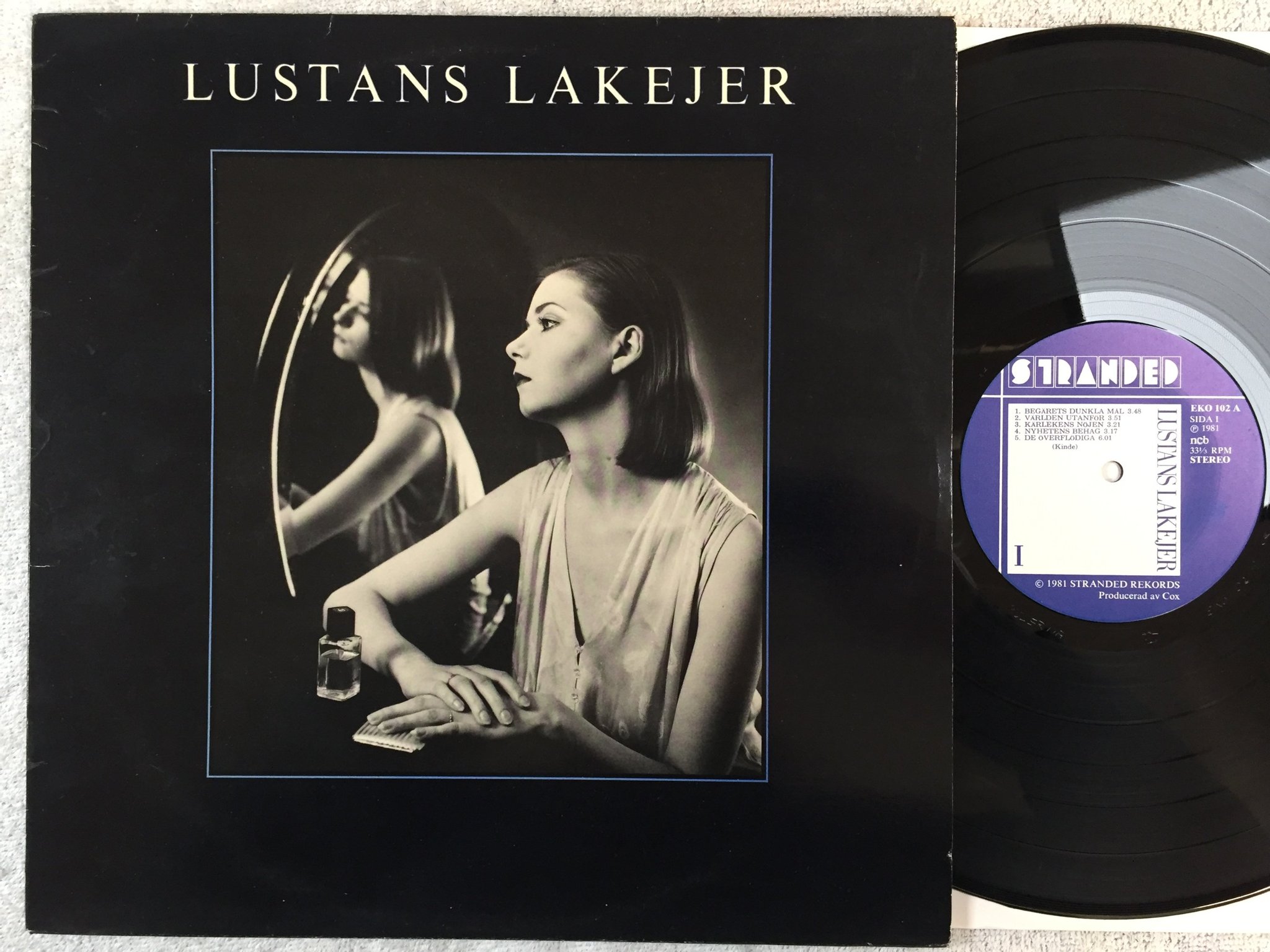 Omslagsbild för skivan LUSTANS LAKEJER s/t LP -81 Swe STRANDED EKO 102