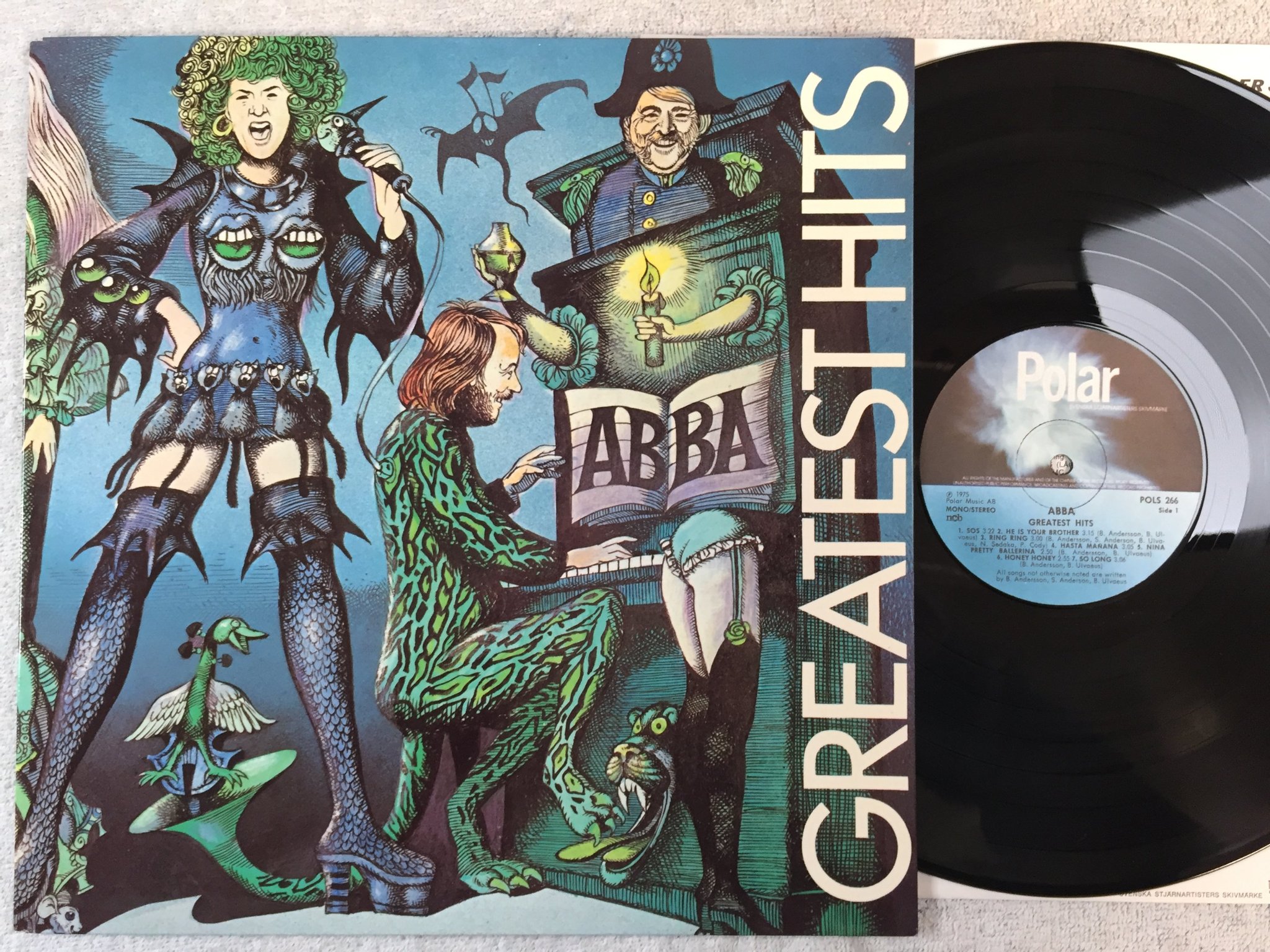 Omslagsbild för skivan ABBA greatest hits LP -75 Swe POLAR POLS 266 Hans Arnold cover art 