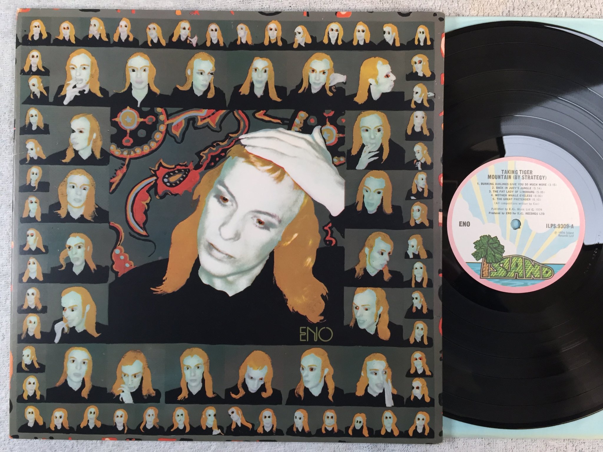 Omslagsbild för skivan BRIAN ENO taking tiger mountain LP -74 UK ISLAND ILPS 9309 pink rim 