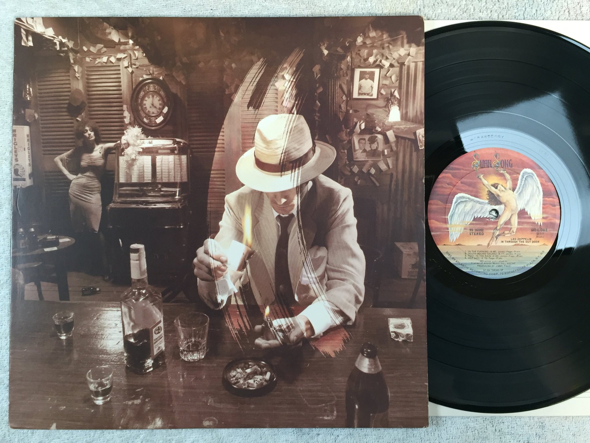 Omslagsbild för skivan LED ZEPPELIN in through out the door LP -79 US SWAN SONG SS 16002 "C" cover