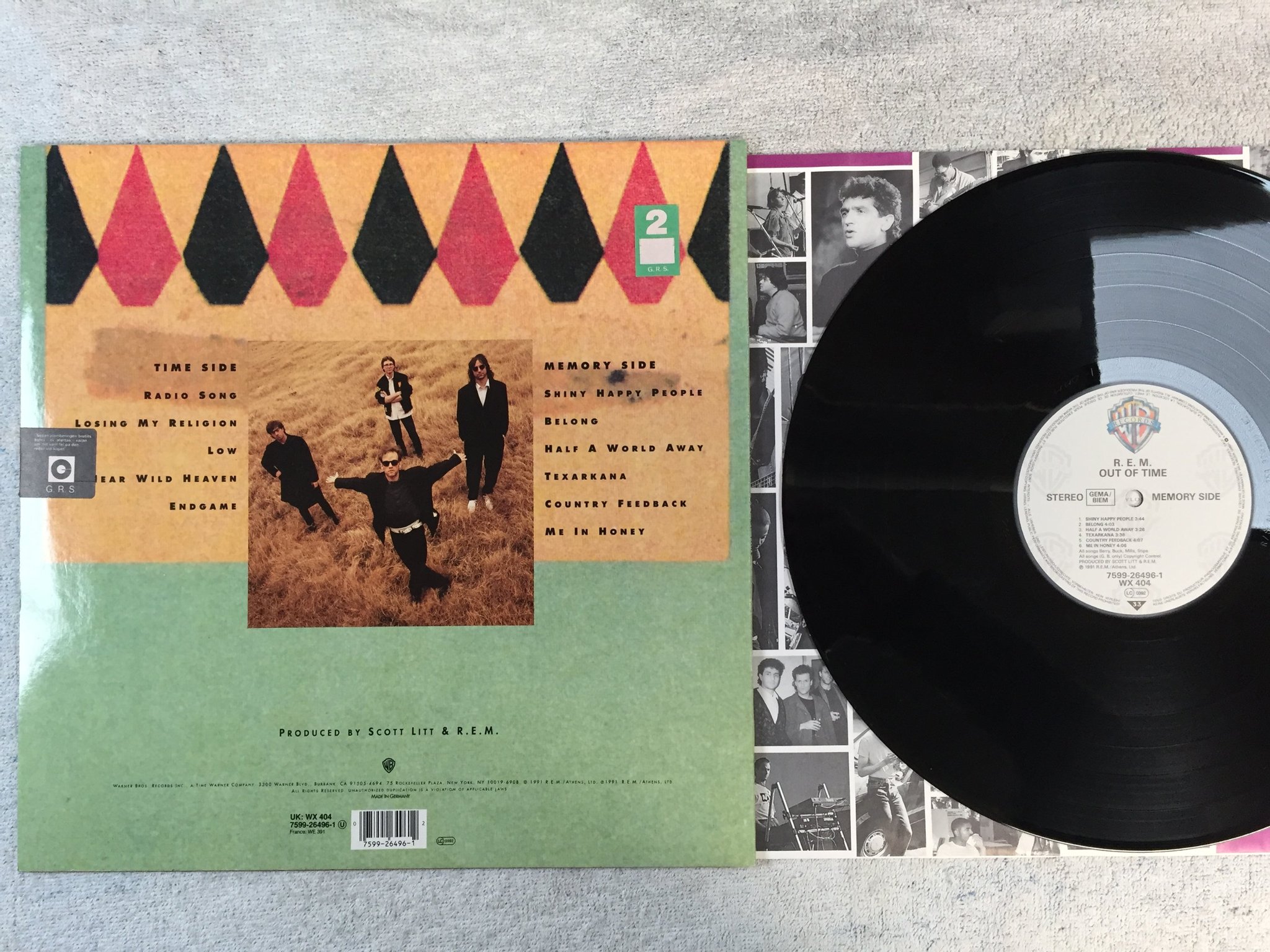 Omslagsbild för skivan R.E.M. out of time LP -91 Ger WARNER BROS 7599-26496-1