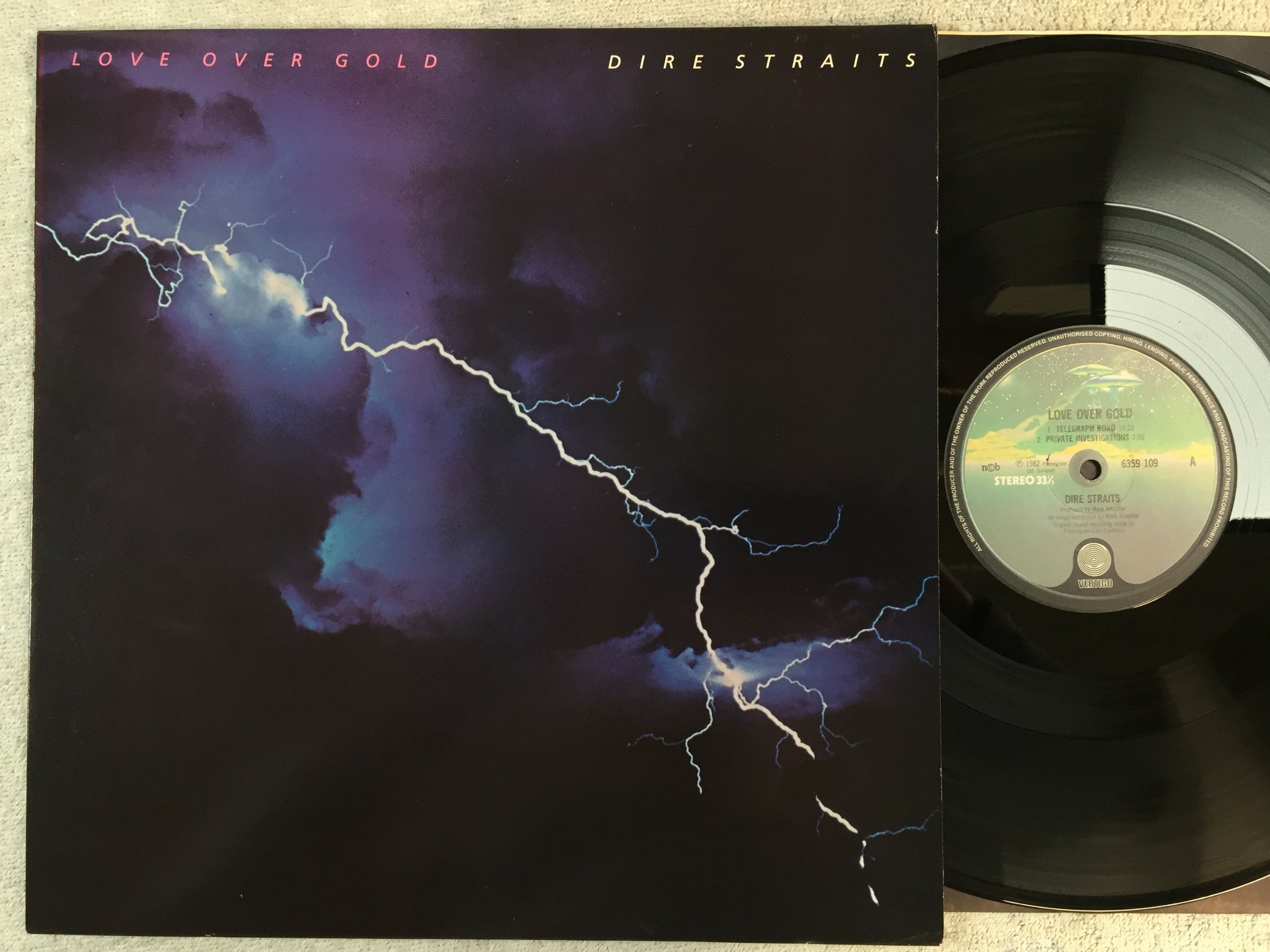 Omslagsbild för skivan DIRE STRAITS love over gold LP ncb -82 VERTIGO 6359109