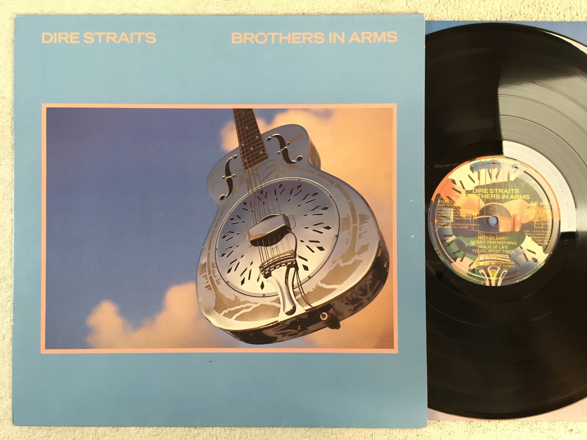 Omslagsbild för skivan DIRE STRAITS brothers in arms LP -85 Hol VERTIGO 824 499-1