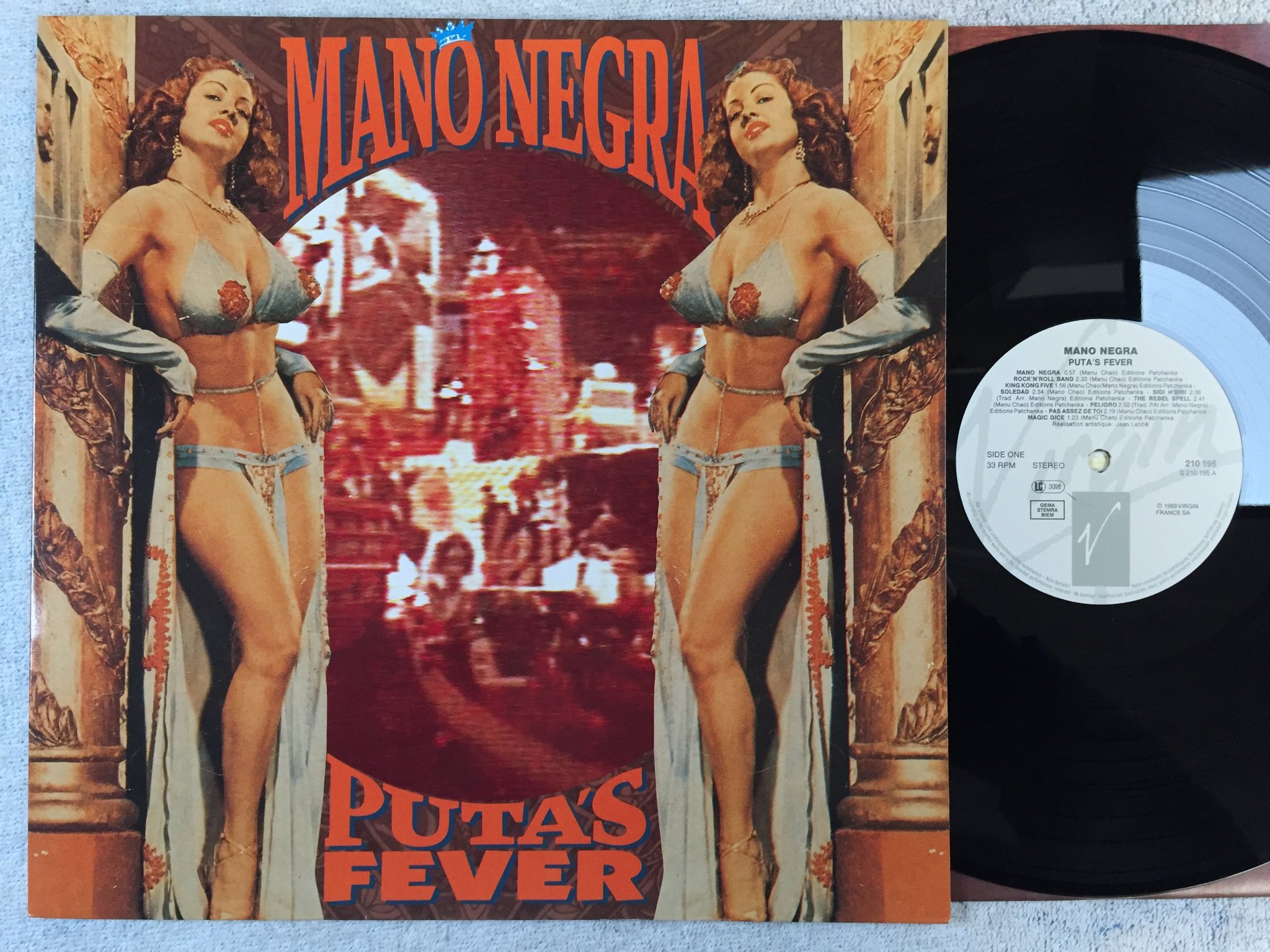 Omslagsbild för skivan MANO NEGRA puta's fever LP -89 Hol VIRGIN 210195