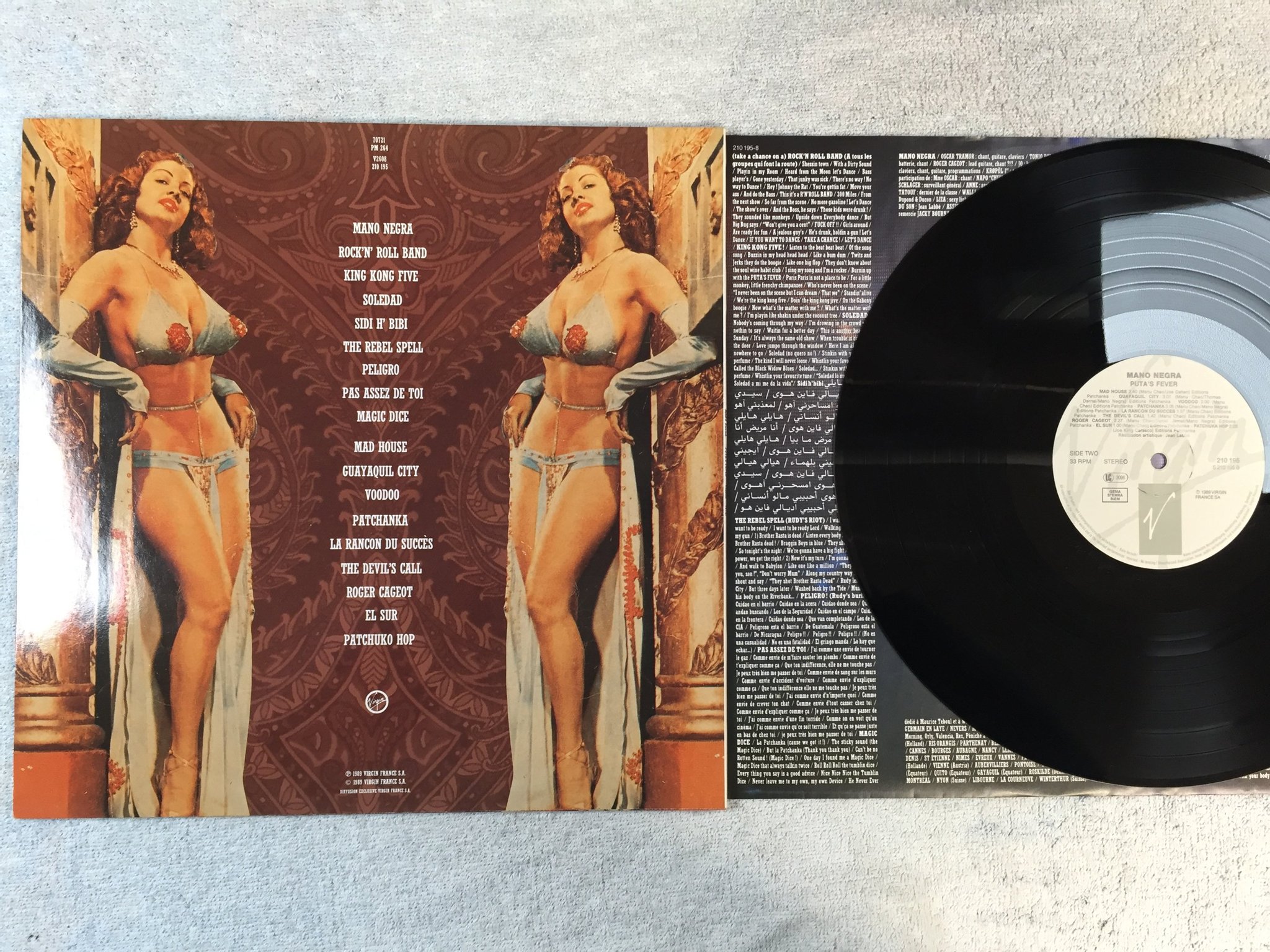 Omslagsbild för skivan MANO NEGRA puta's fever LP -89 Hol VIRGIN 210195