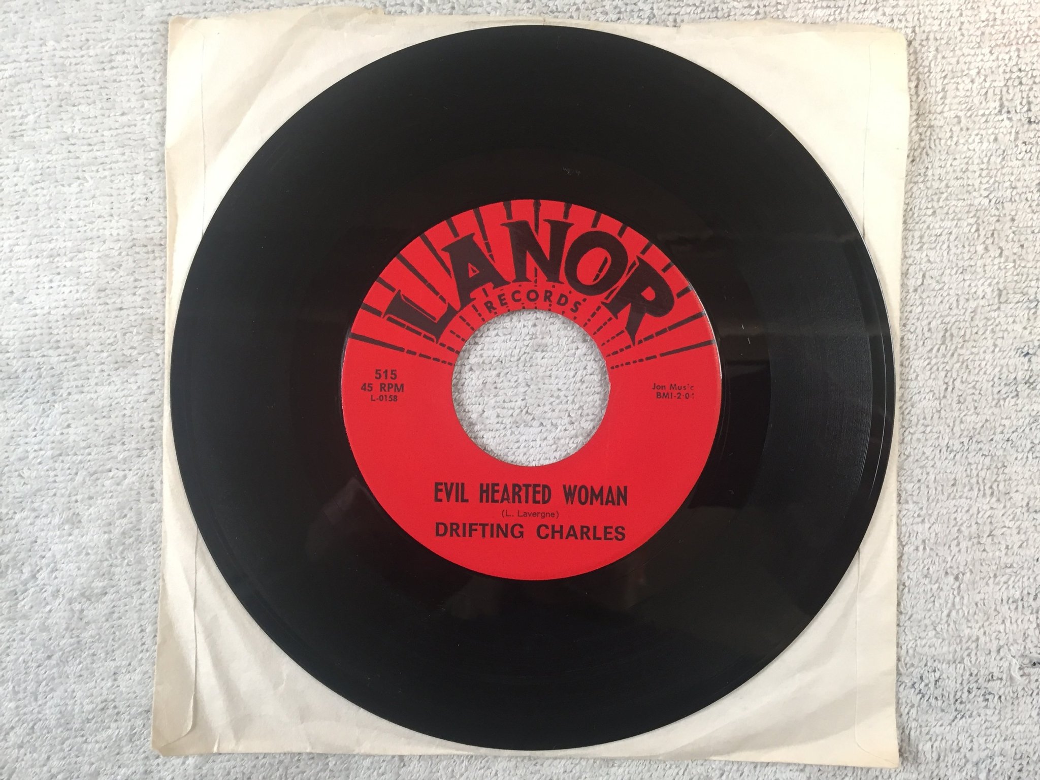 Omslagsbild för skivan DRIFTING CHARLES evil hearted woman 7"single US LANOR 515 r&b