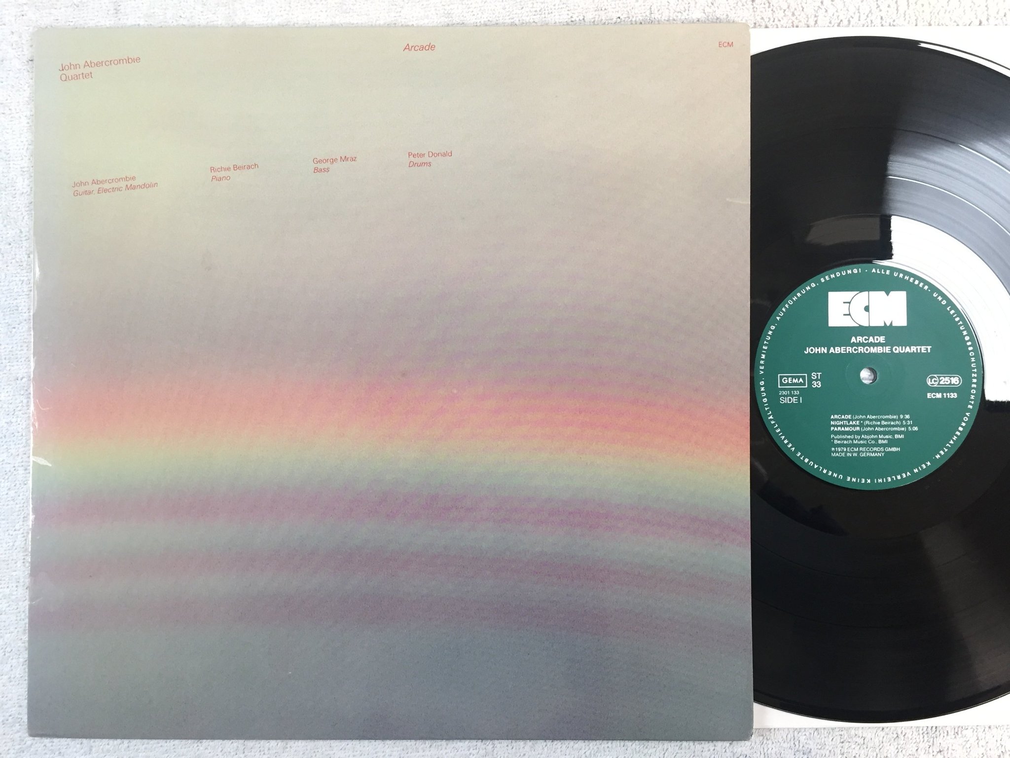 Omslagsbild för skivan JOHN ABERCROMBIE QUARTET arcade LP -79 Ger ECM 1133 ST