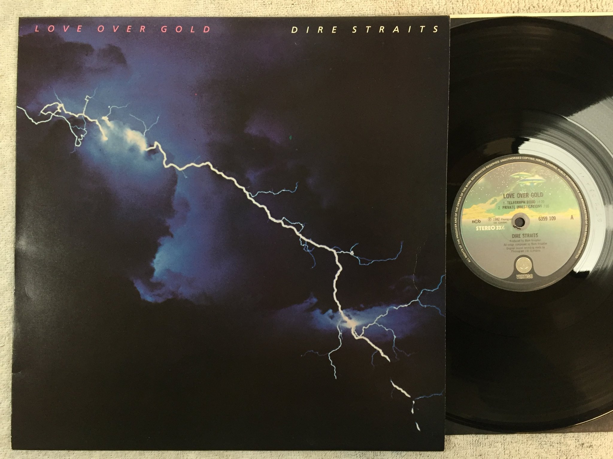 Omslagsbild för skivan DIRE STRAITS - love over gold LP -82 ncb VERTIGO 6359 109