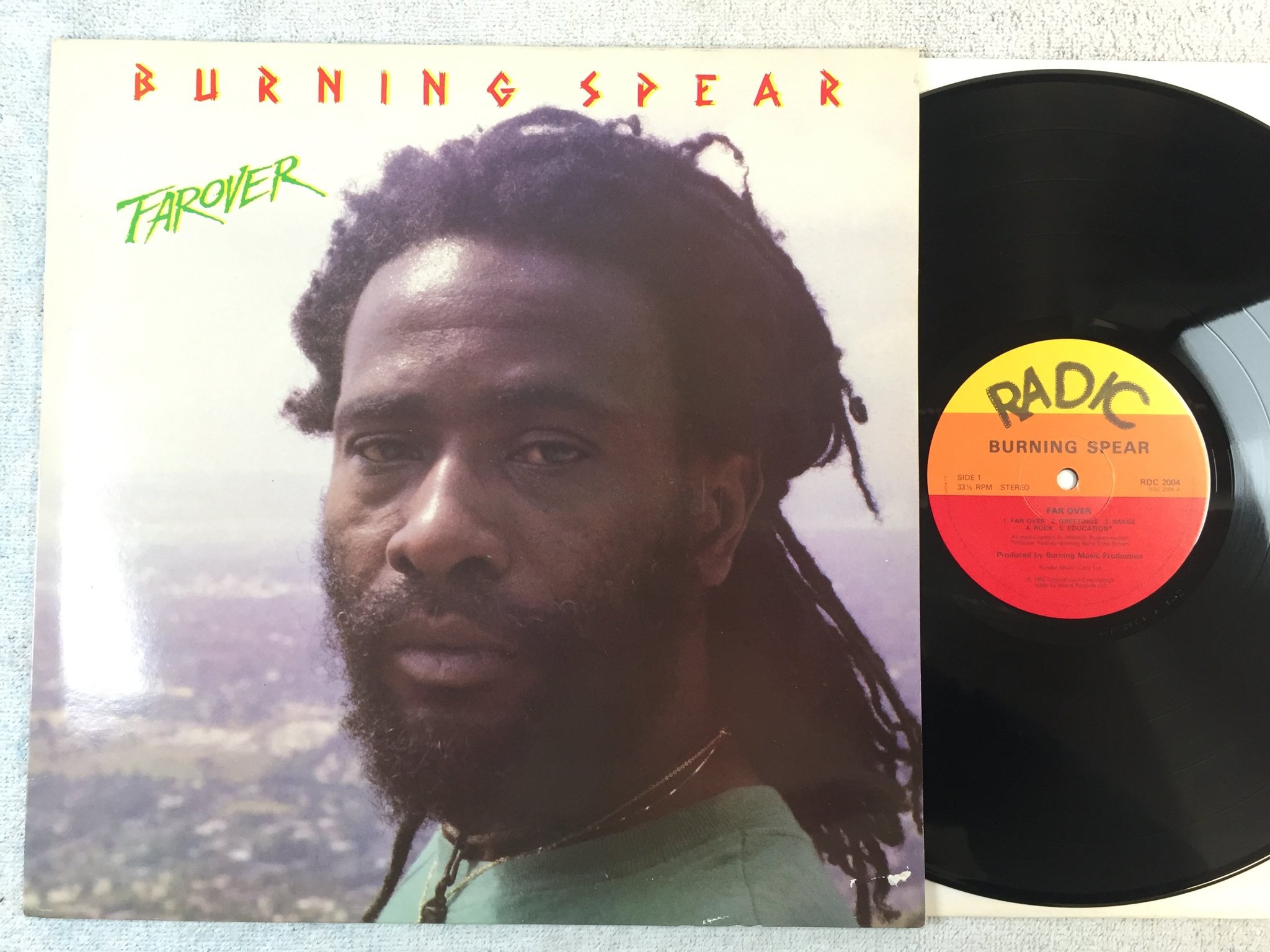 Omslagsbild för skivan BURNING SPEAR far over LP -82 UK RADIC RDC 2004