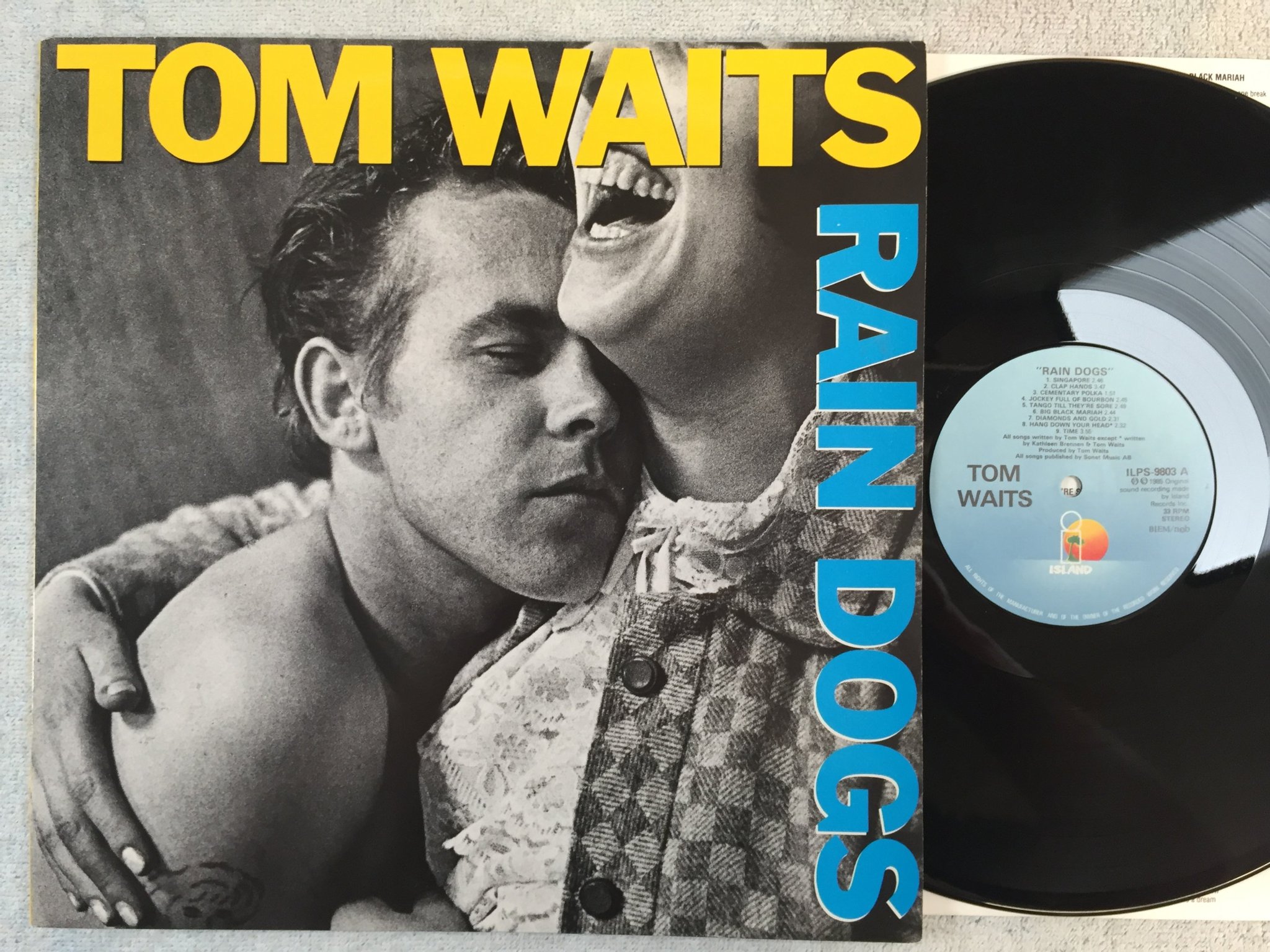 Omslagsbild för skivan TOM WAITS rain dogs LP ncb -85  ISLAND ILPS-9803
