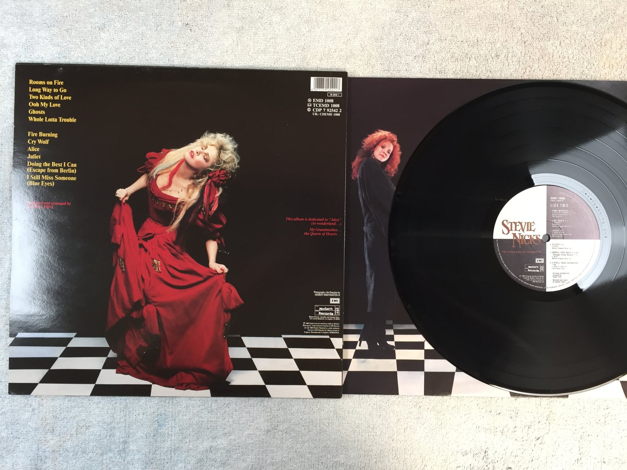 Omslagsbild för skivan STEVIE NICKS The Other Side Of The Mirror LP -89 UK EMI EMD 1008  w/ hologram
