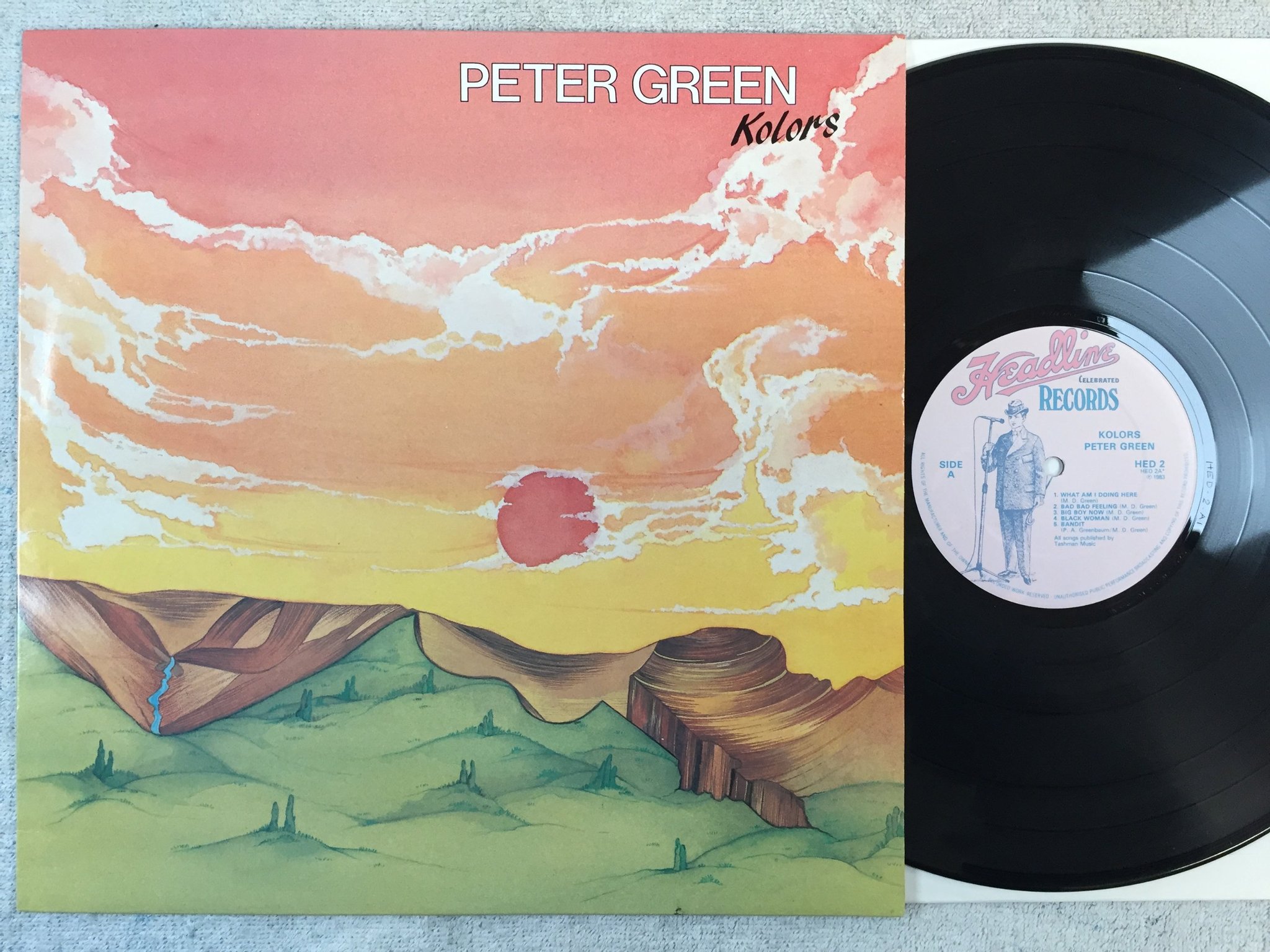 Omslagsbild för skivan PETER GREEN Kolors LP -83 UK HEADLINE HED 2 