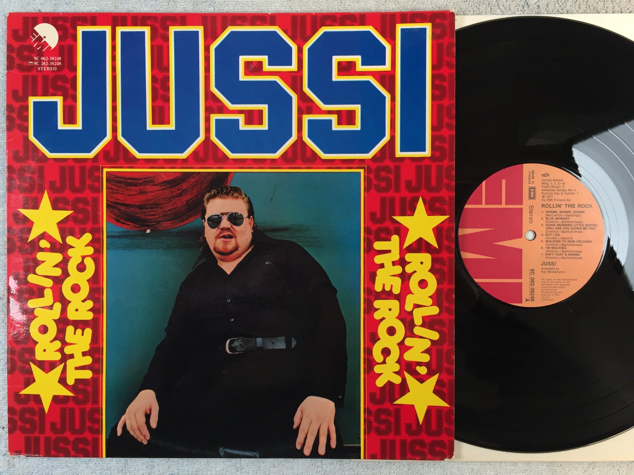 Omslagsbild för skivan JUSSI rollin the rock LP -77 Finland EMI 9C 062-38248