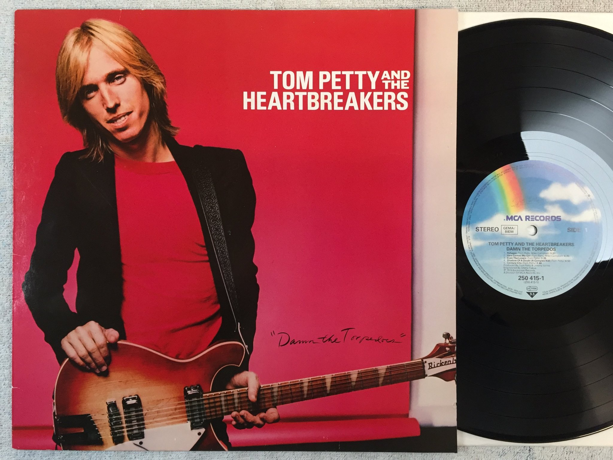 Omslagsbild för skivan TOM PETTY & THE HEARTBREAKERS damn the torpedos LP -79 Ger MCA 250 415-1