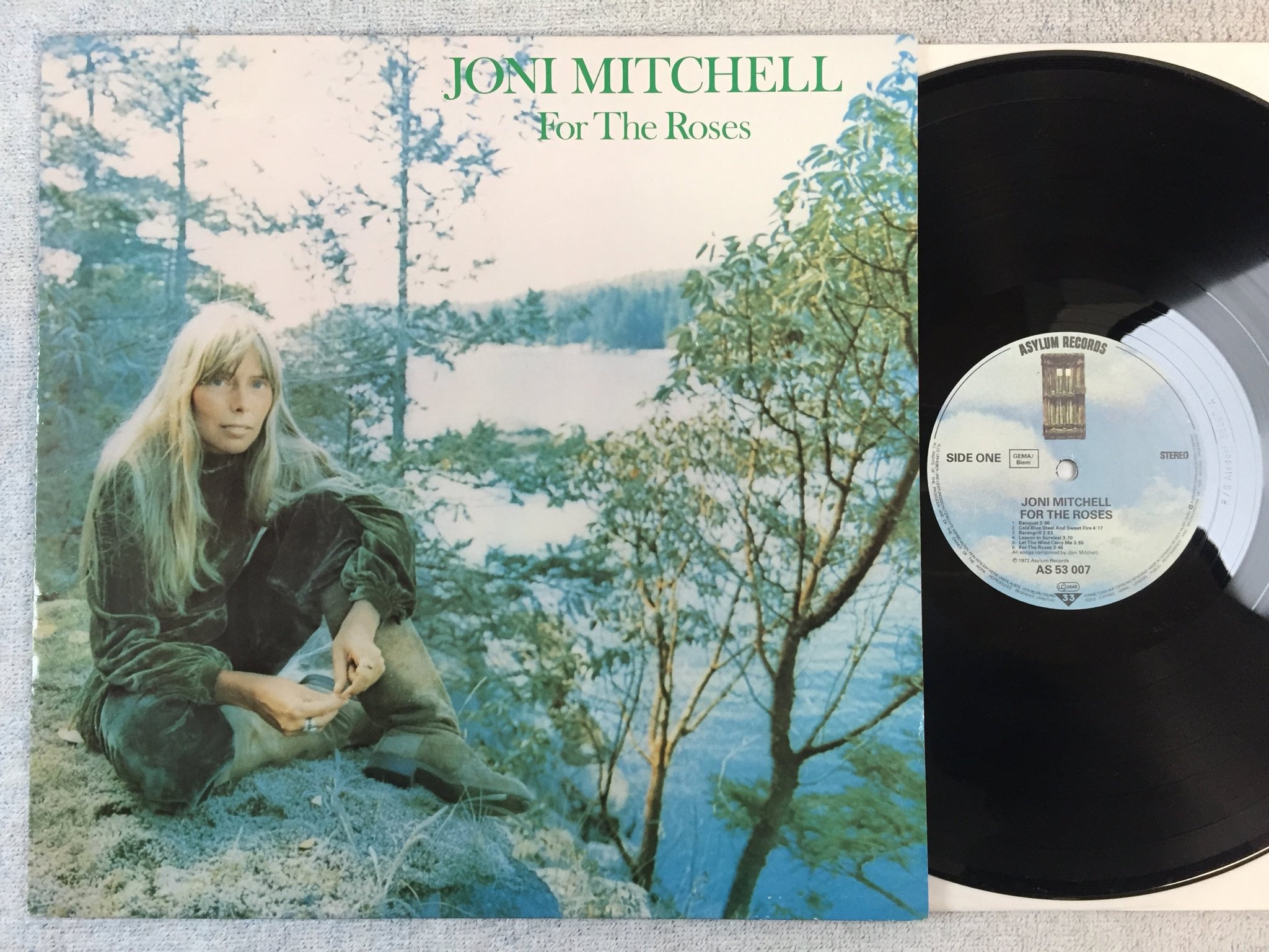 Omslagsbild för skivan JONI MITCHELL For The Roses LP  re Ger AYLUM AS 53 007