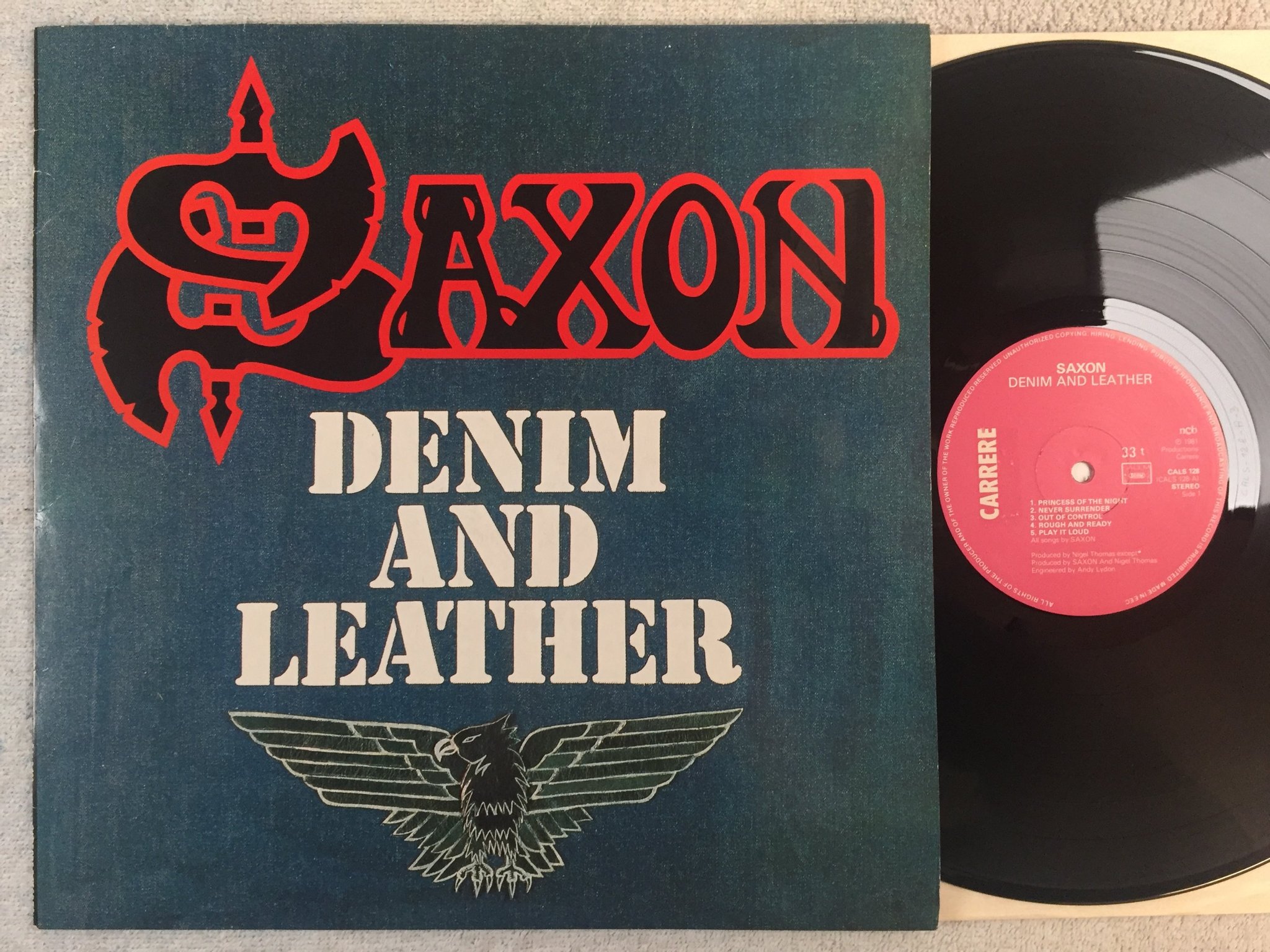 Omslagsbild för skivan SAXON denim and leather LP -81 ncb CARRERE CALS 128