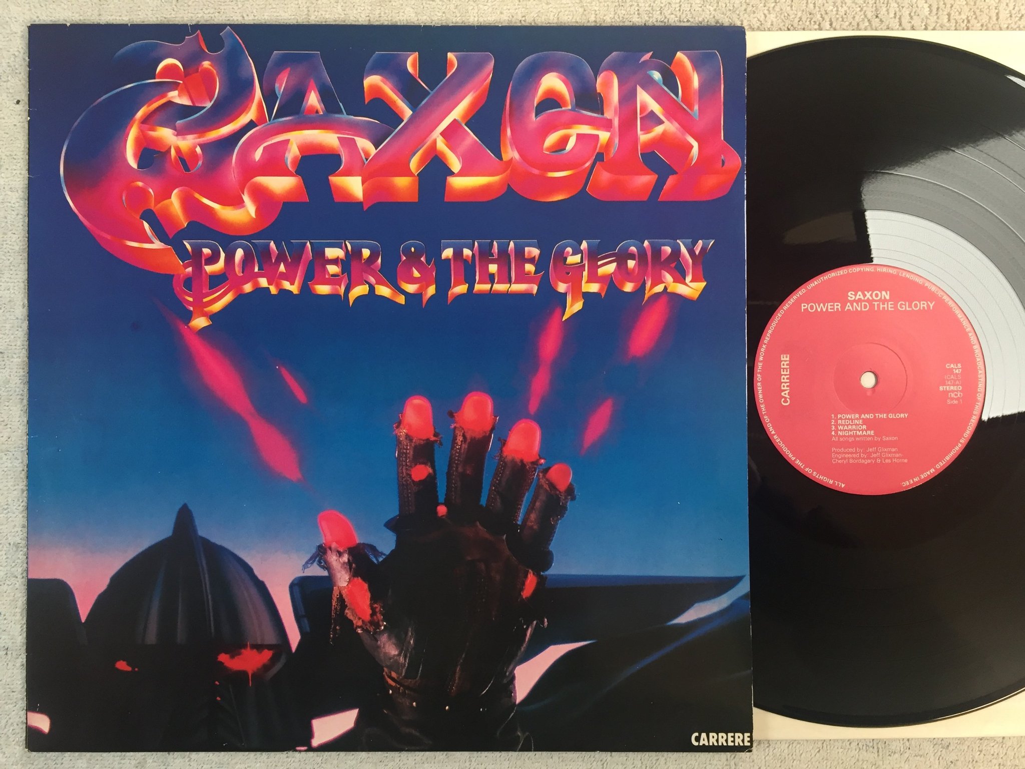 Omslagsbild för skivan SAXON power and the glory LP -83 ncb CARRERE CALS 147